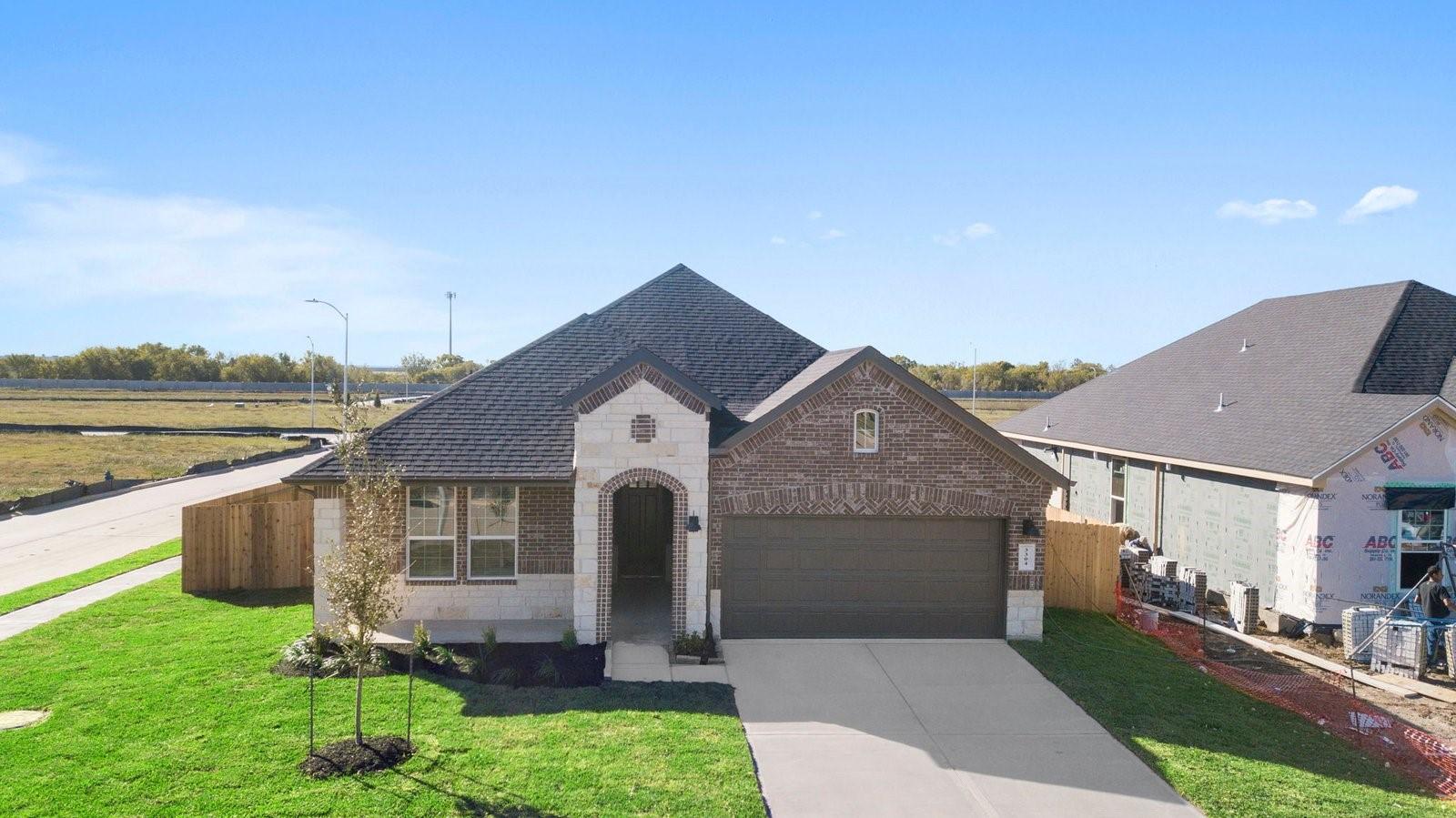 Image 1: Newly built single story home with traditional arc
