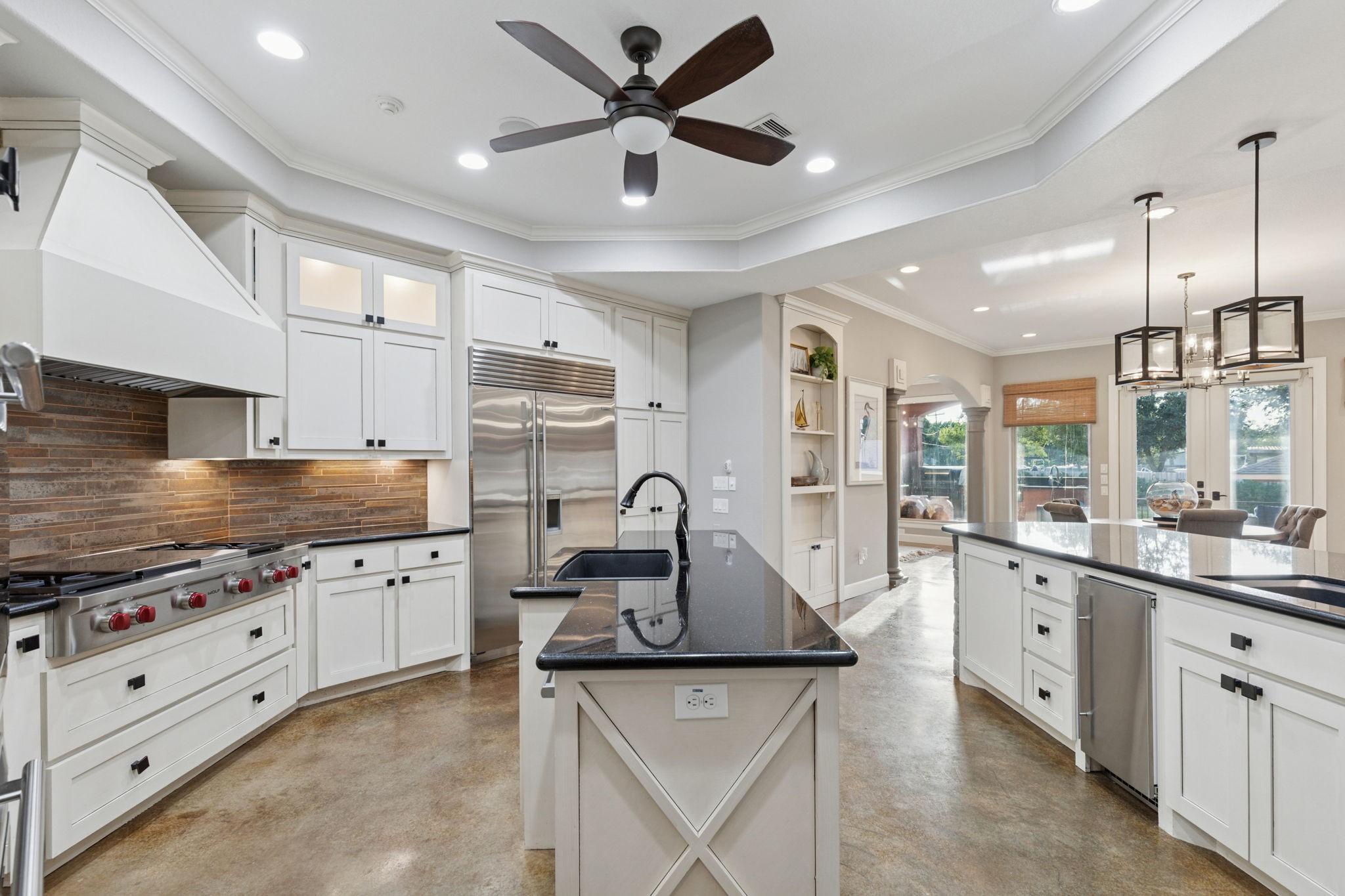 Image 2: This kitchen features Quartz countertops with an i