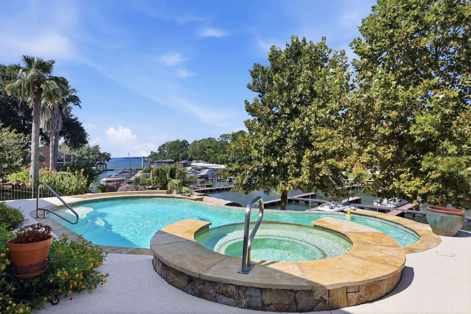 Image 3: pool, spa, and covered patio overlook marina