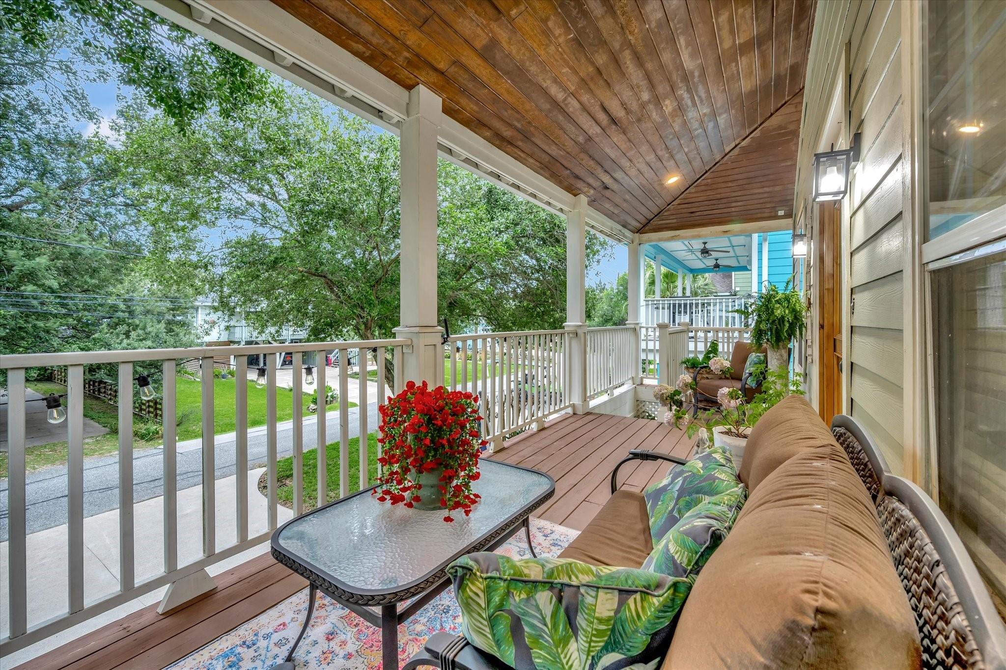 Image 3: This inviting photo showcases a charming covered p