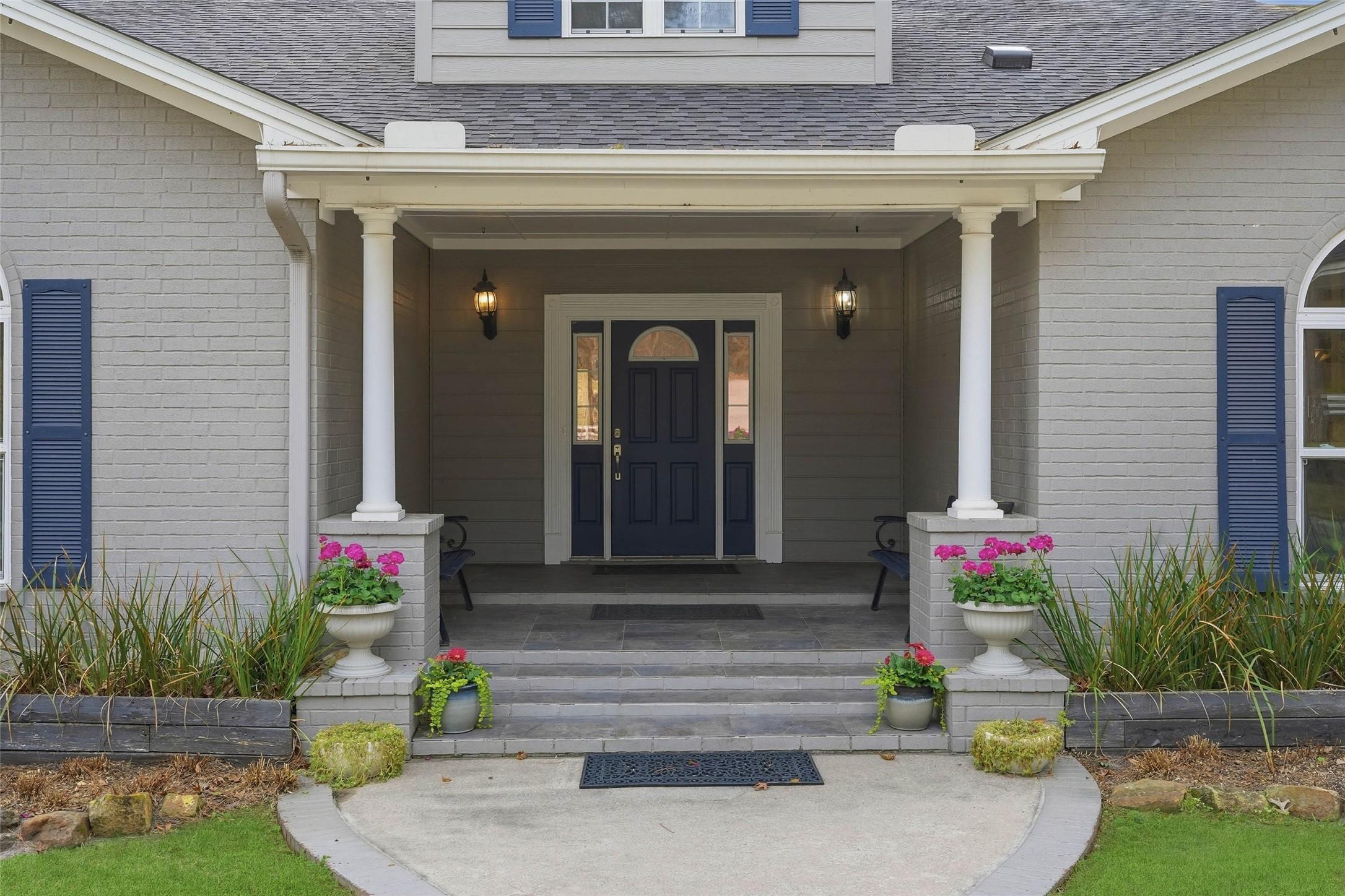 Image 3: Beautiful landscaping throughout the property and