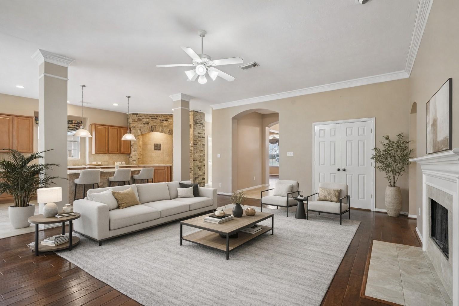 Image 2: Digitally staged - Open floor plan, family room