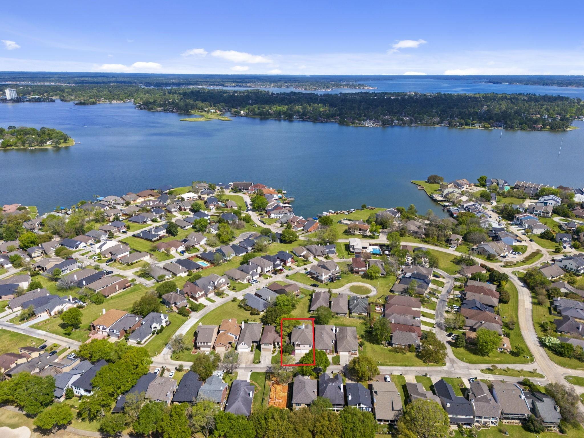 Image 3: This aerial photo showcases a picturesque neighbor