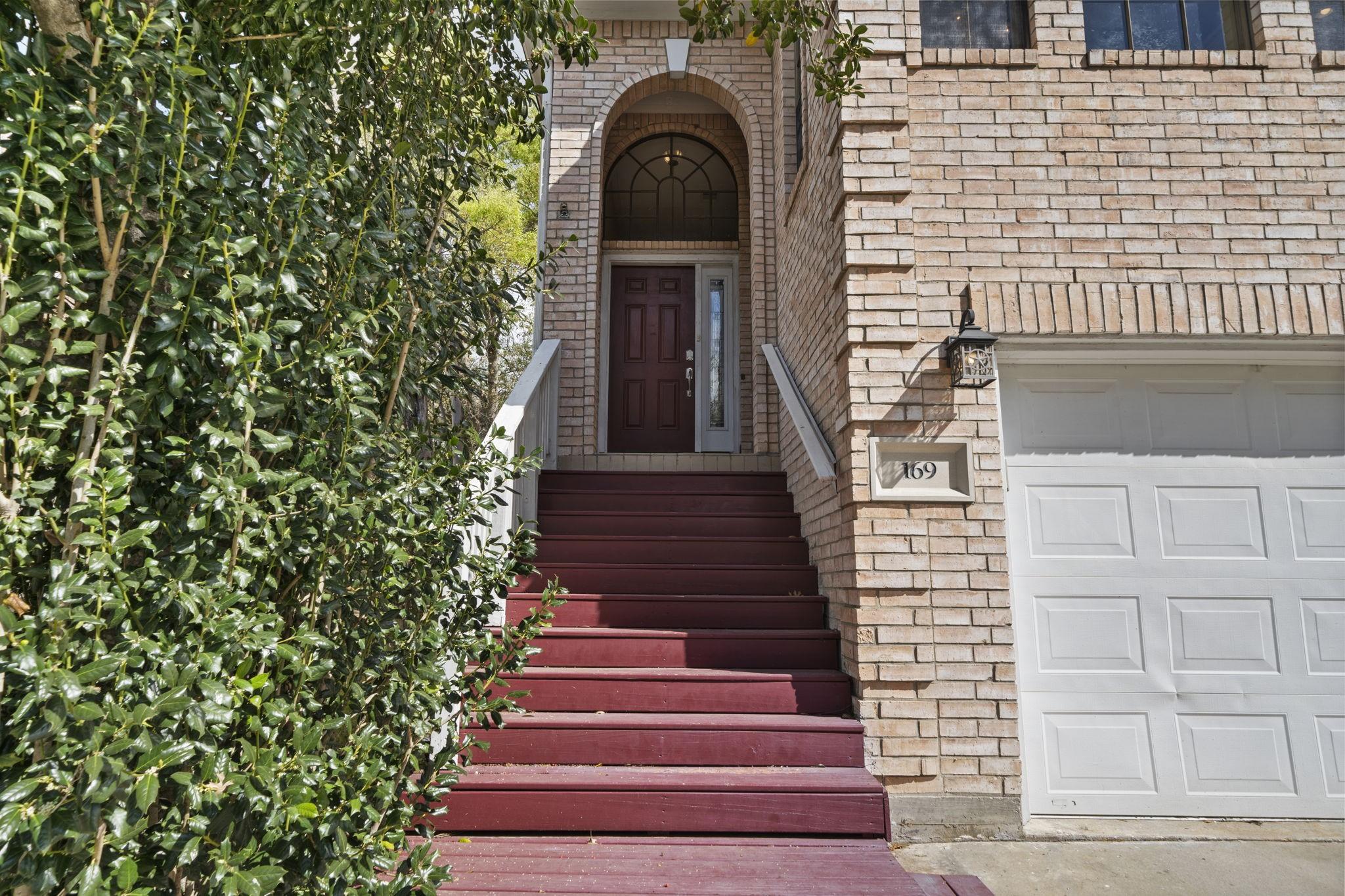 Image 4: The beautiful front porch is the perfect welcome t