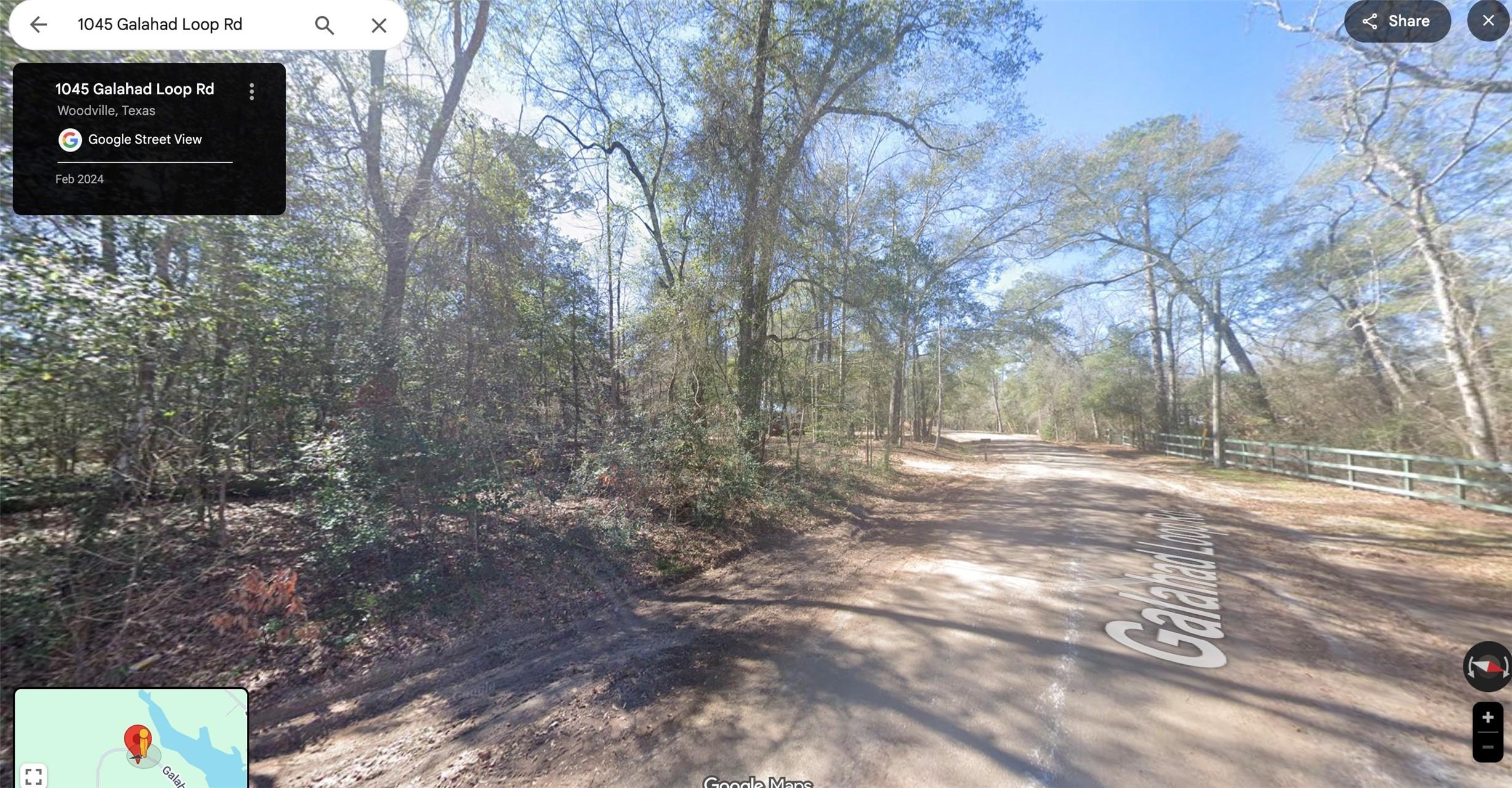 Image 2: View of the street with the property on the left