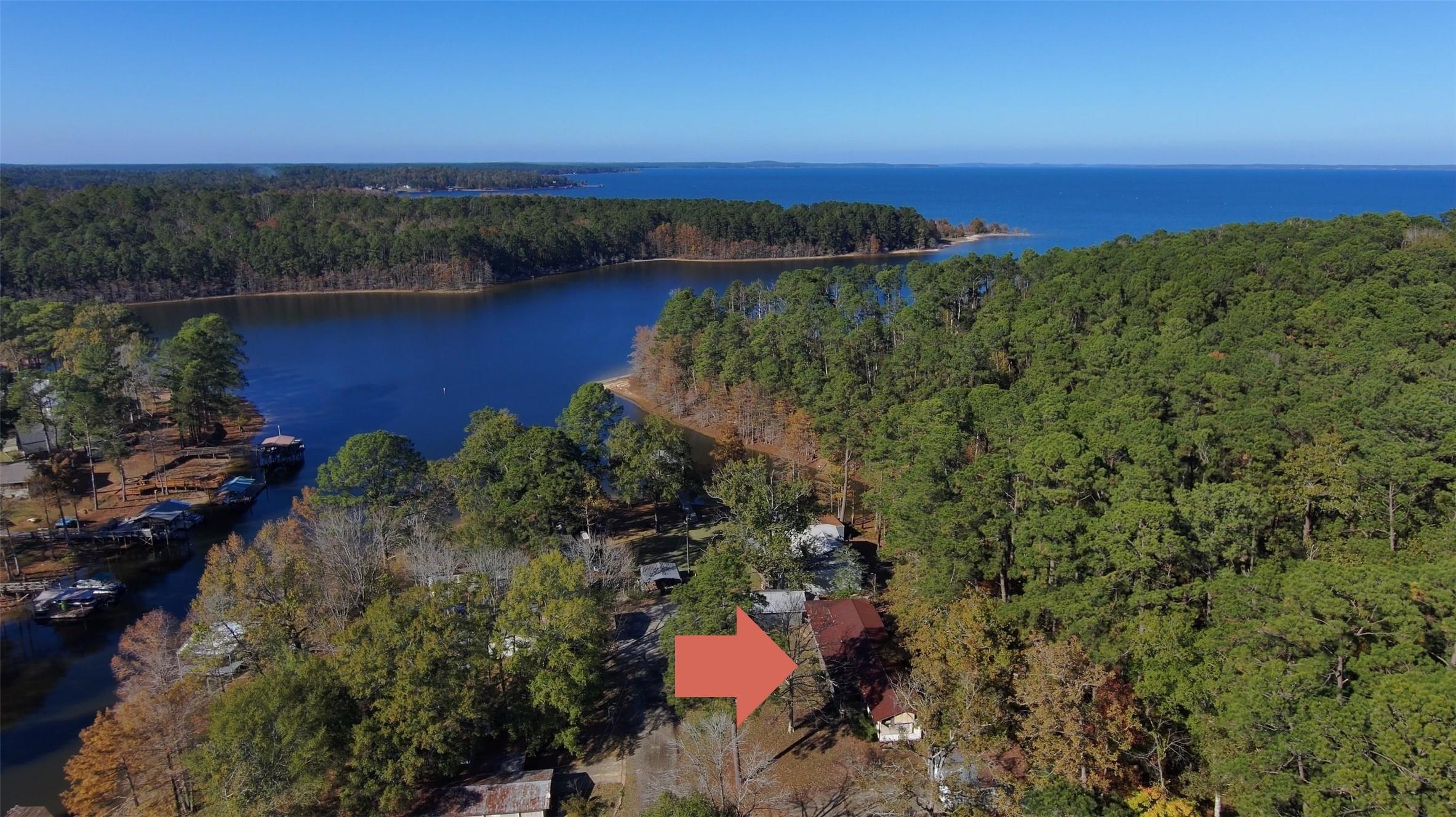 Image 3: Drone shot over home (red roof.) Lake in front, Na