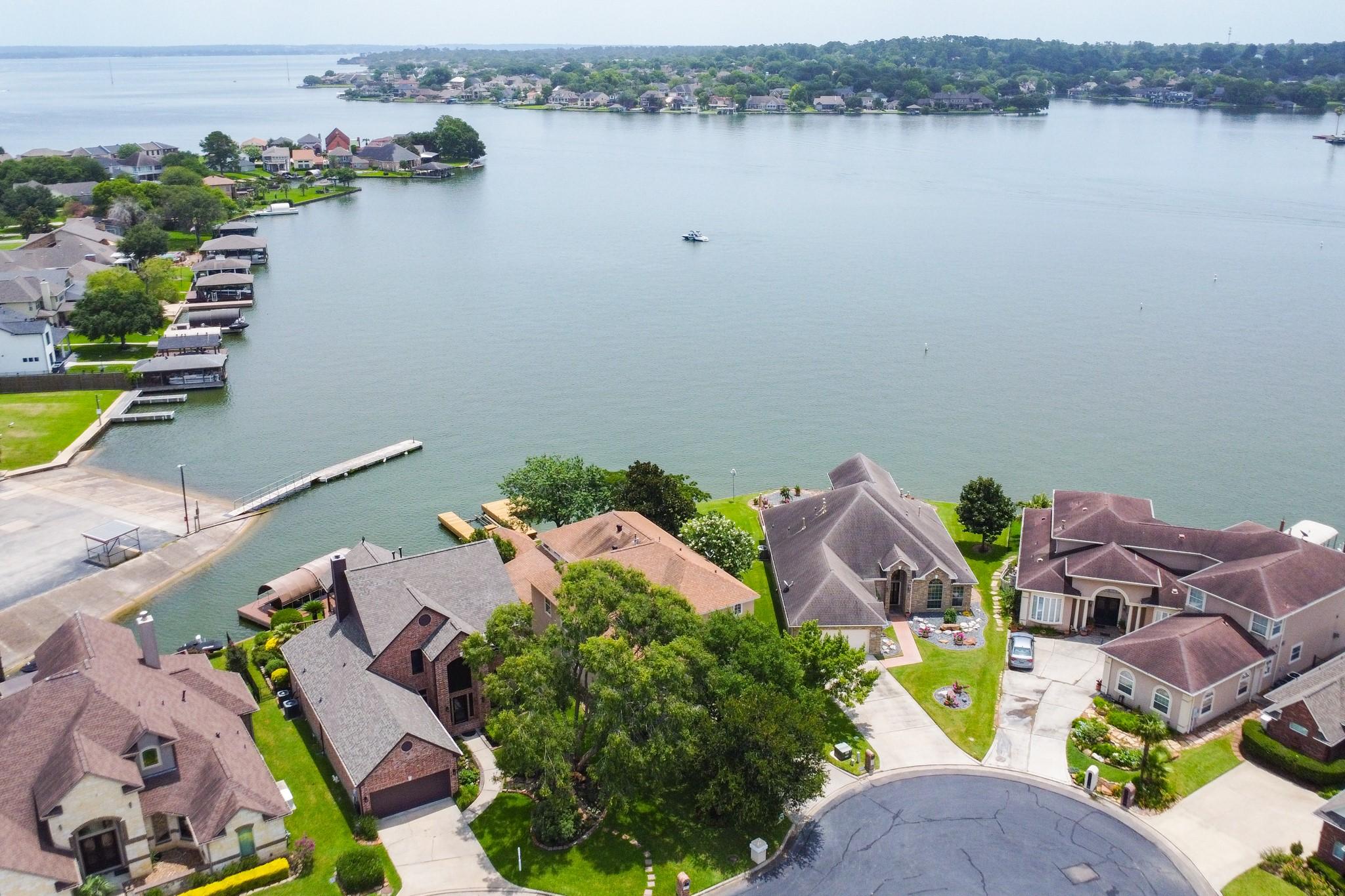 Image 3: Private boat dock behind property makes for great
