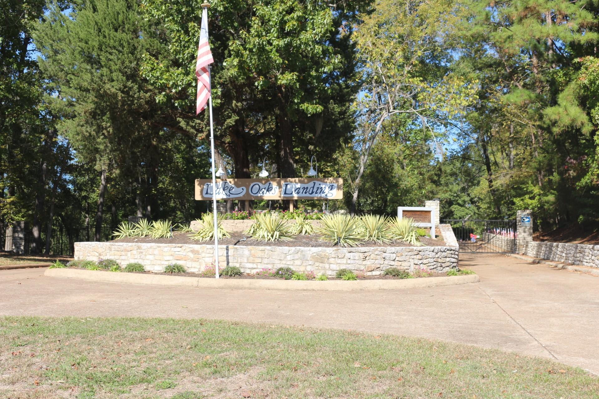 Image 1: This photo showcases the entrance to "Lake Oaks La