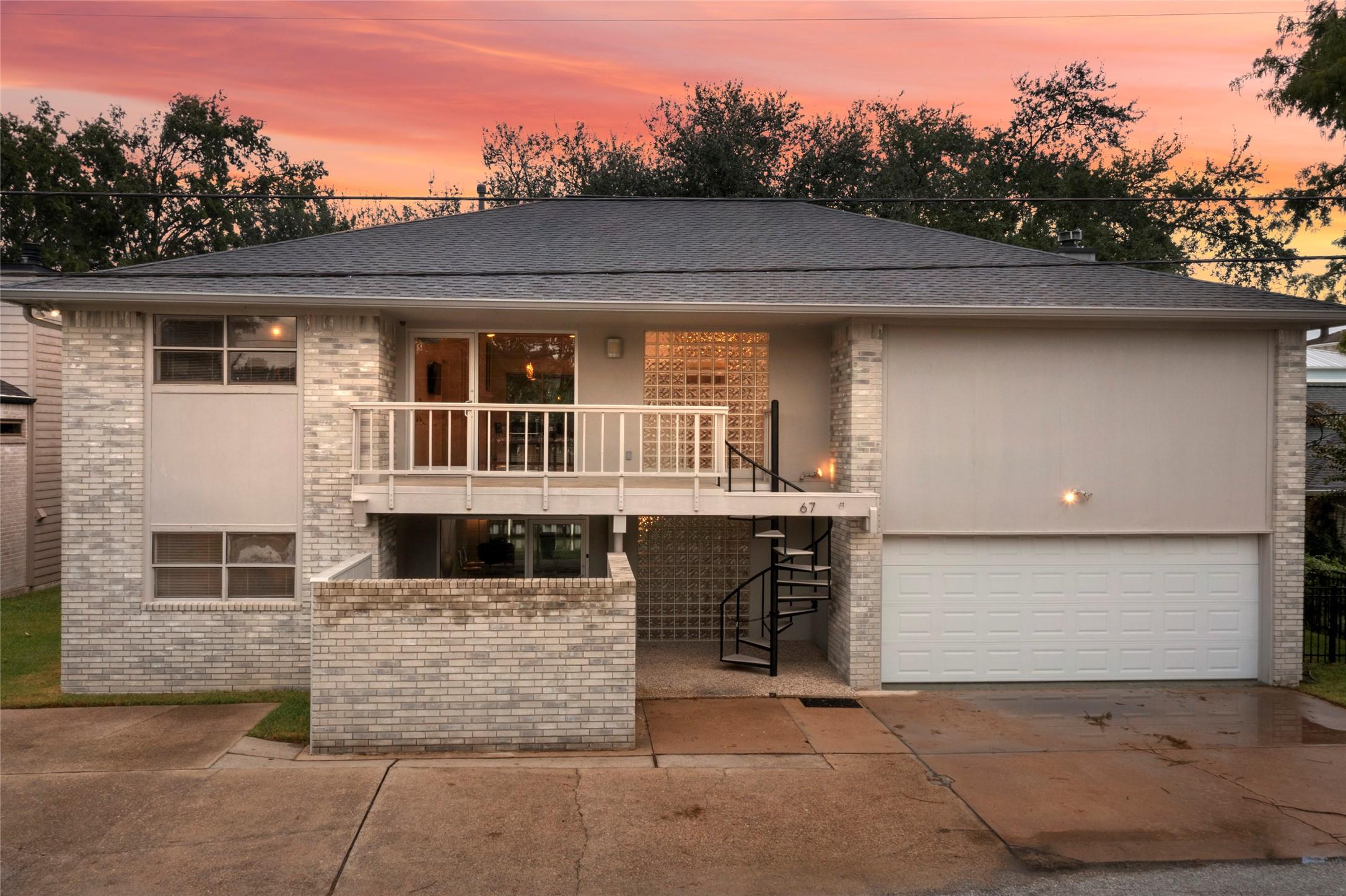 Image 2: Discover modern elegance in this two-story home, b