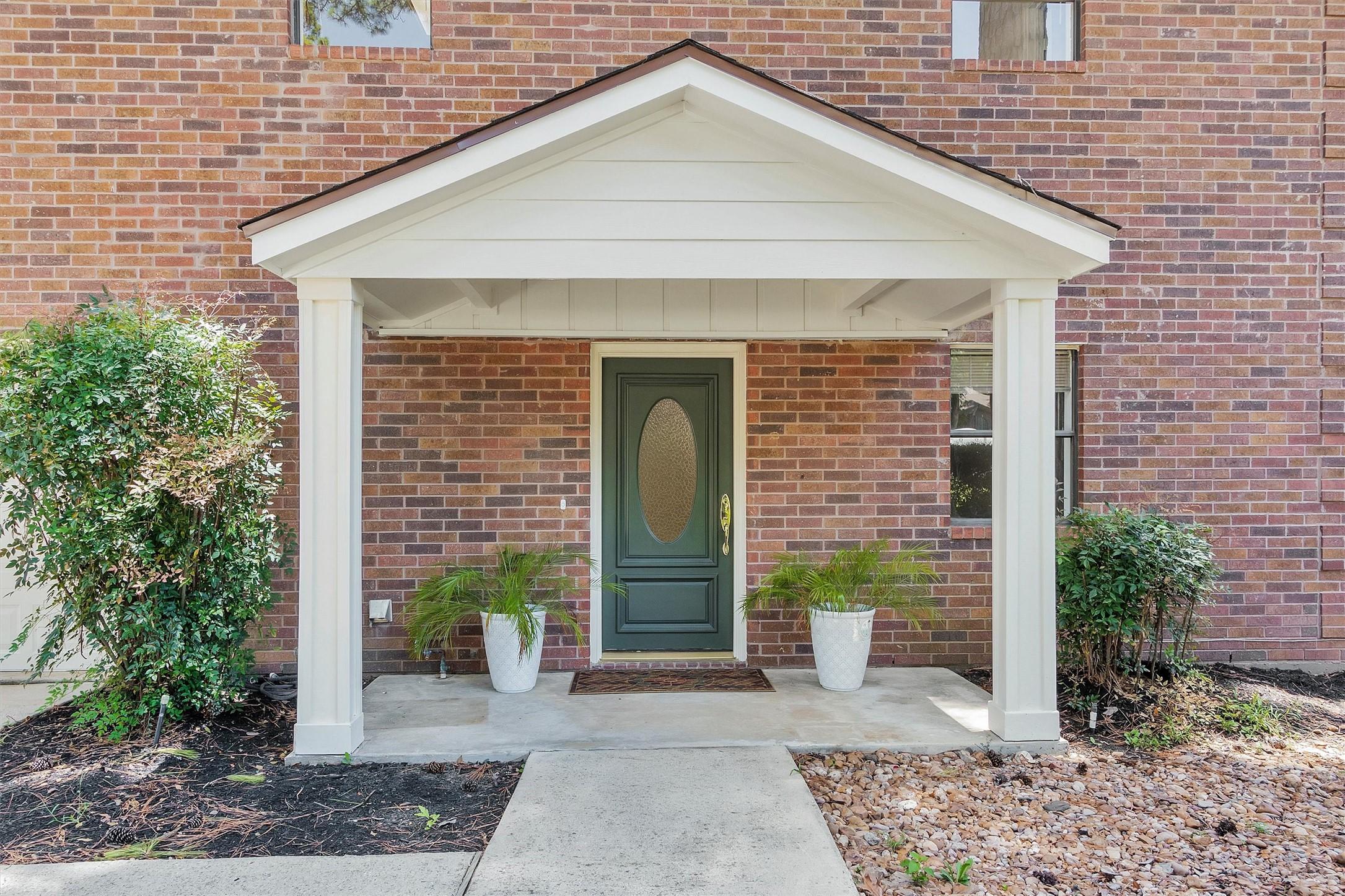 Image 3: Nice front entry.  Home has recently been repainte