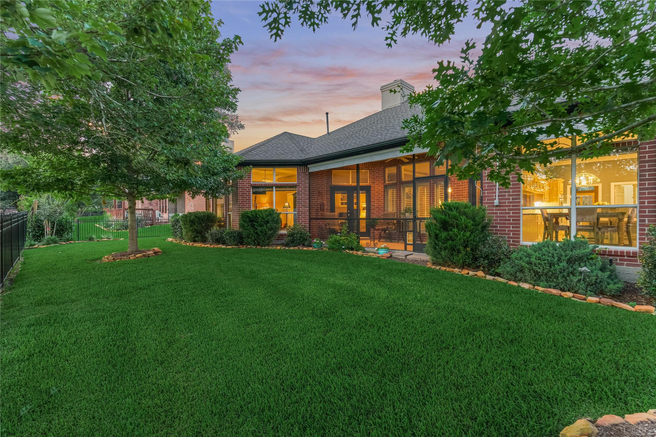 Image 2: The oversized backyard can easily accommodate a fu