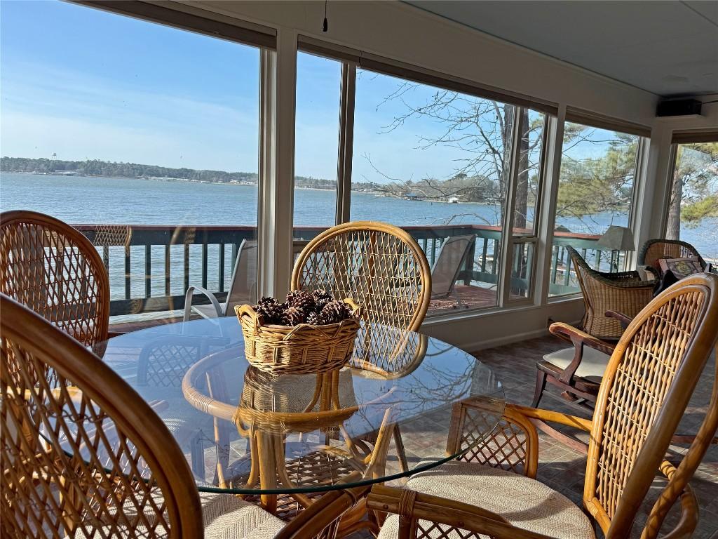 Image 2: Great view of the lake from this sunroom.
