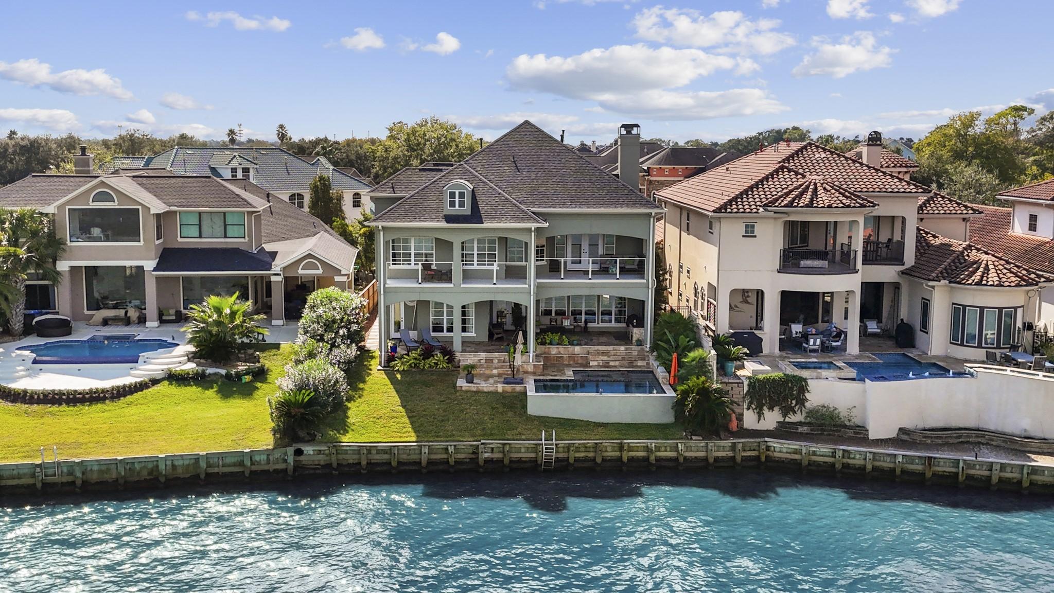 Image 1: Welcome home to the exclusive, gated community of