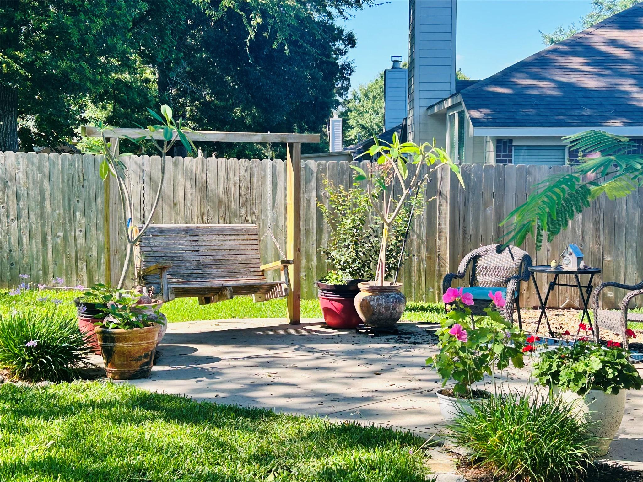 Image 2: 242 Sunset Path N - Spacious backyard with attract