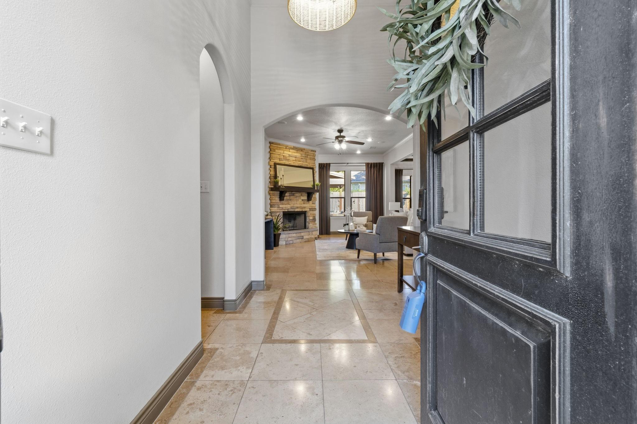 Image 3: Enjoy high ceilings, travertine tile floors, crown