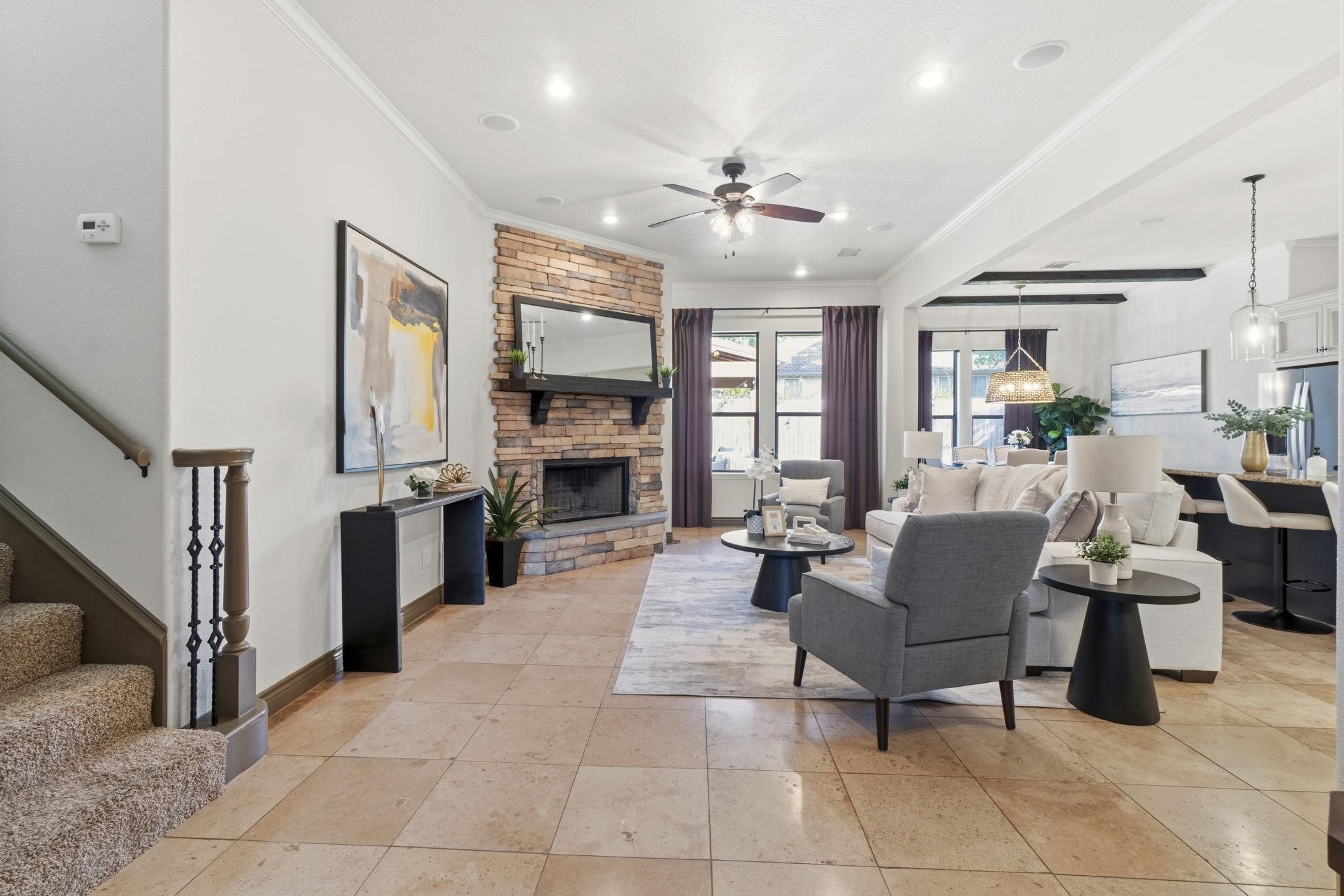 Image 4: Enjoy high ceilings, travertine tile floors, crown