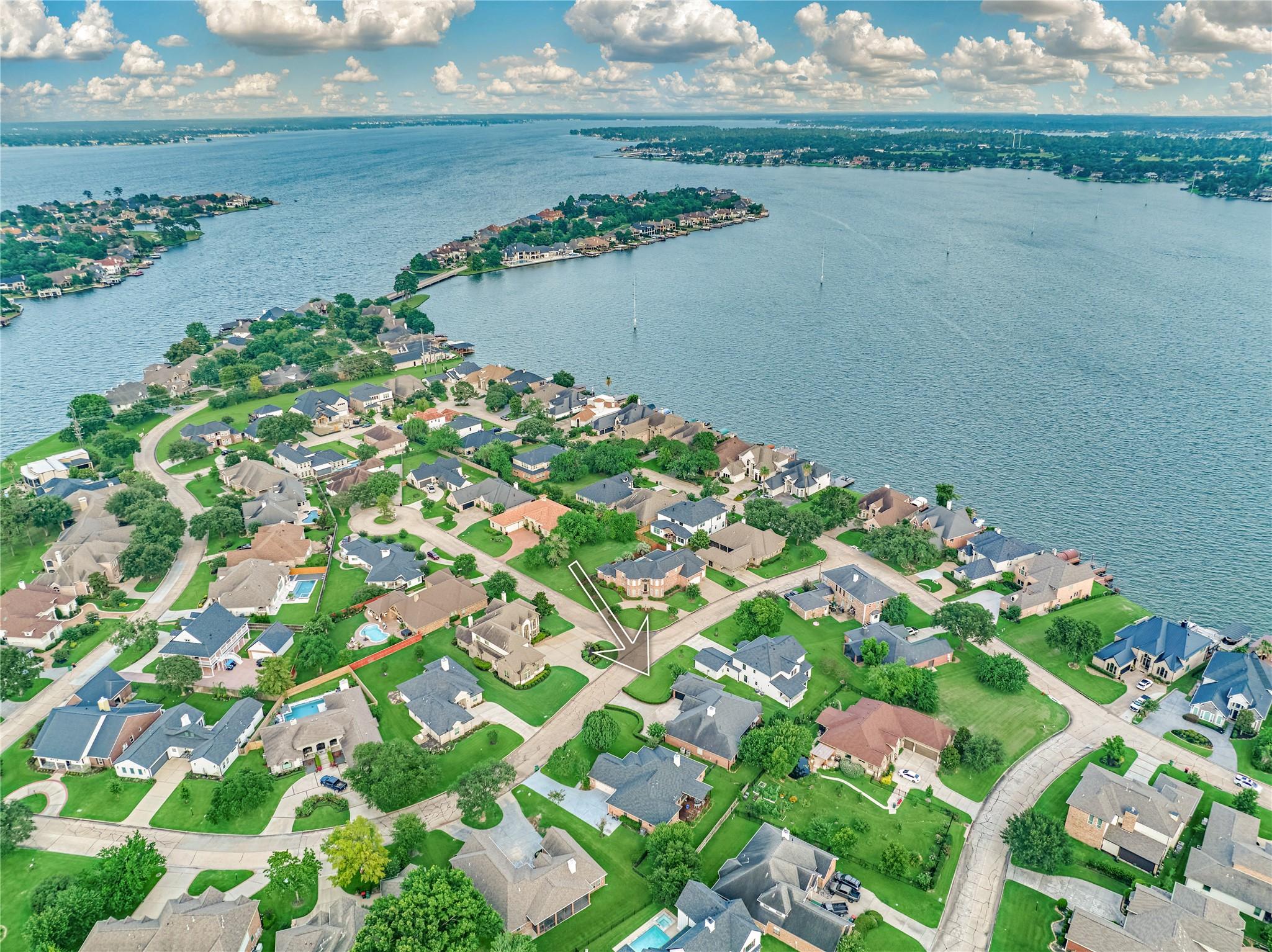 Image 3: Nestled on an expansive 11,111 sq. ft. lot, this c