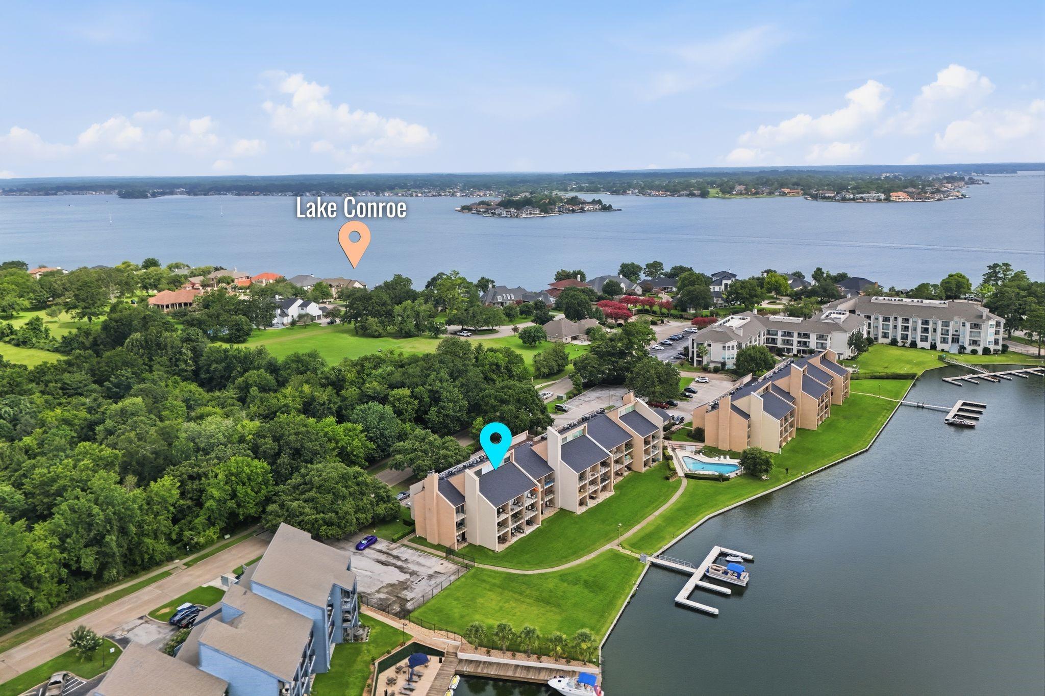 Image 1: Aerial view - Walden Lodge along Lake Conroe shore