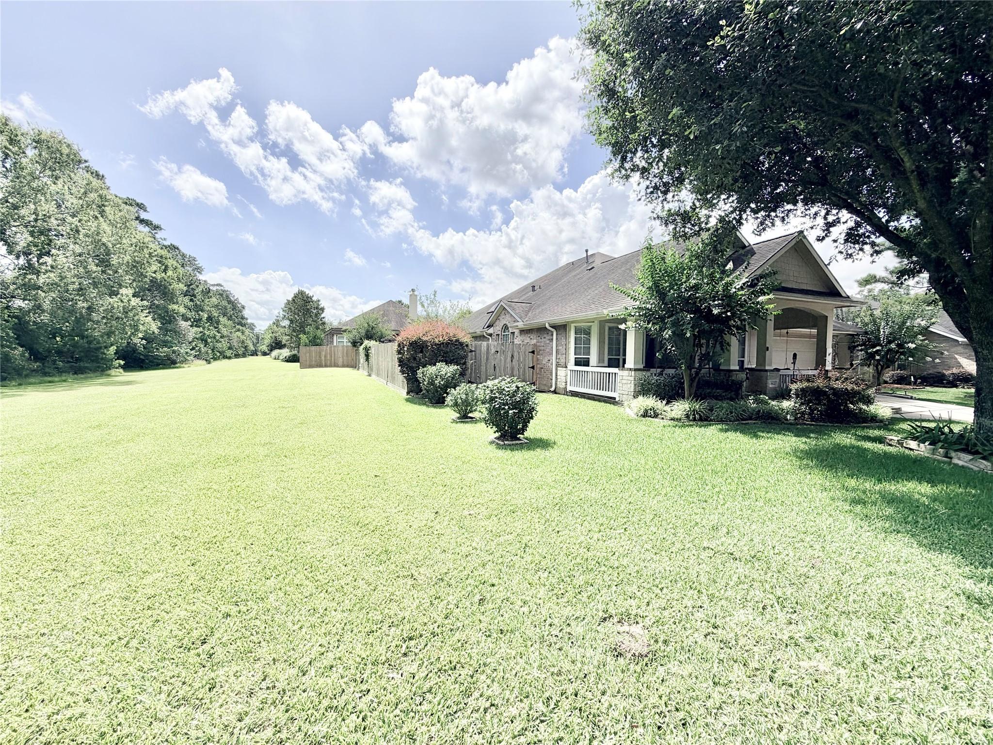 Image 2: This home is next to a lush greenbelt with scenic