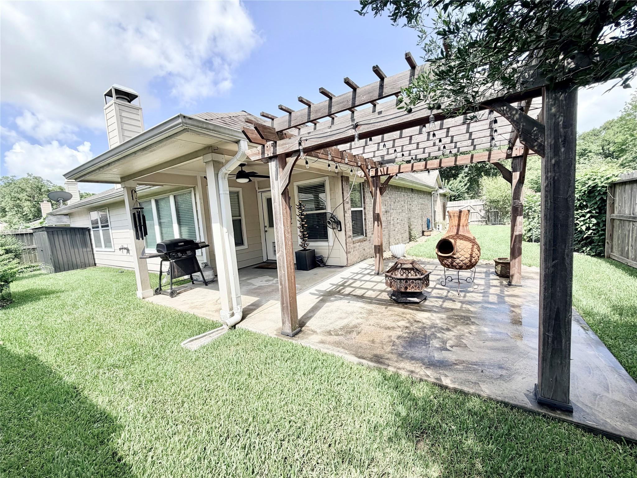 Image 4: Discover outdoor bliss with a charming backyard fe
