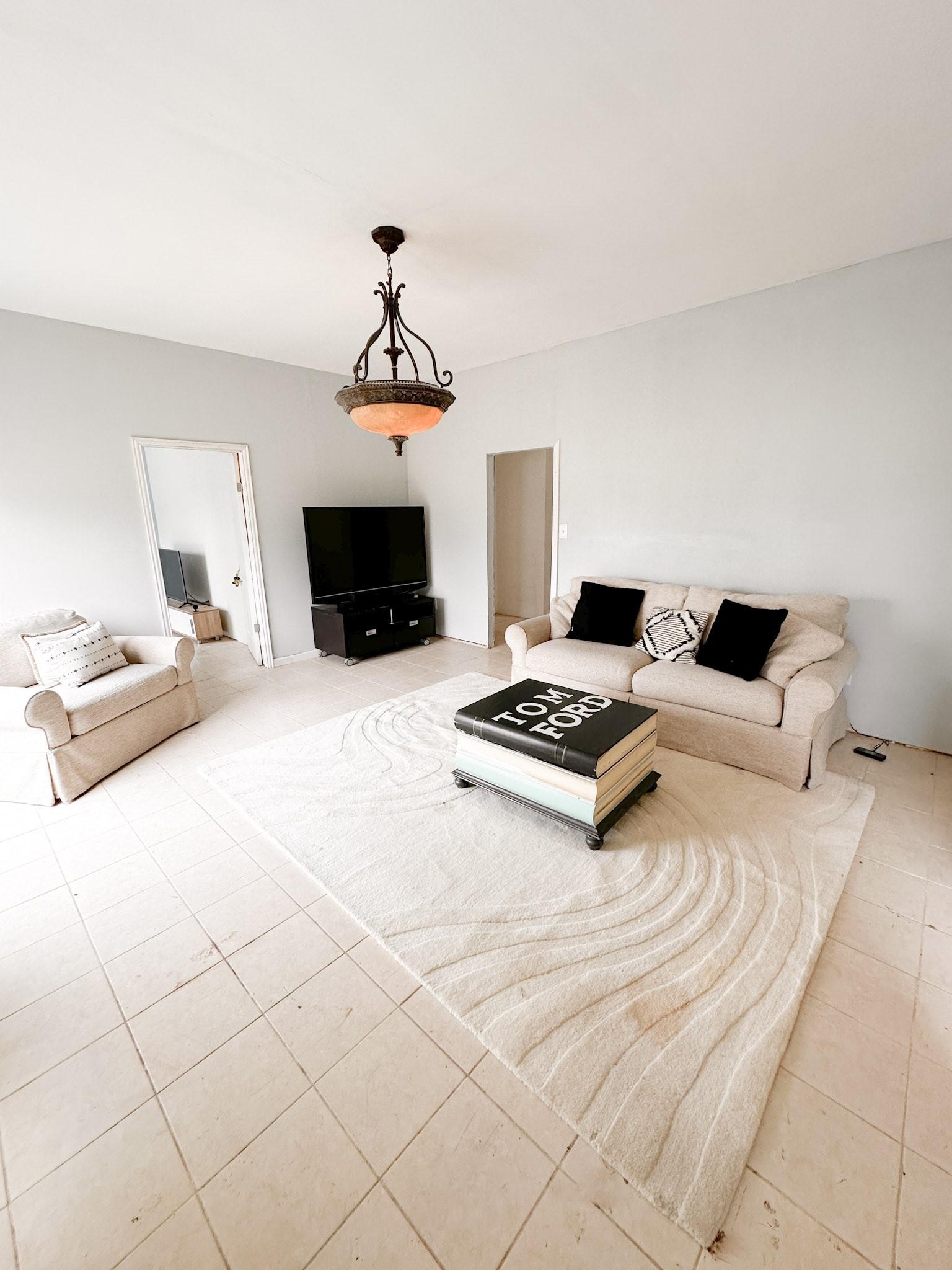 Image 4: View from the front door into the living room.