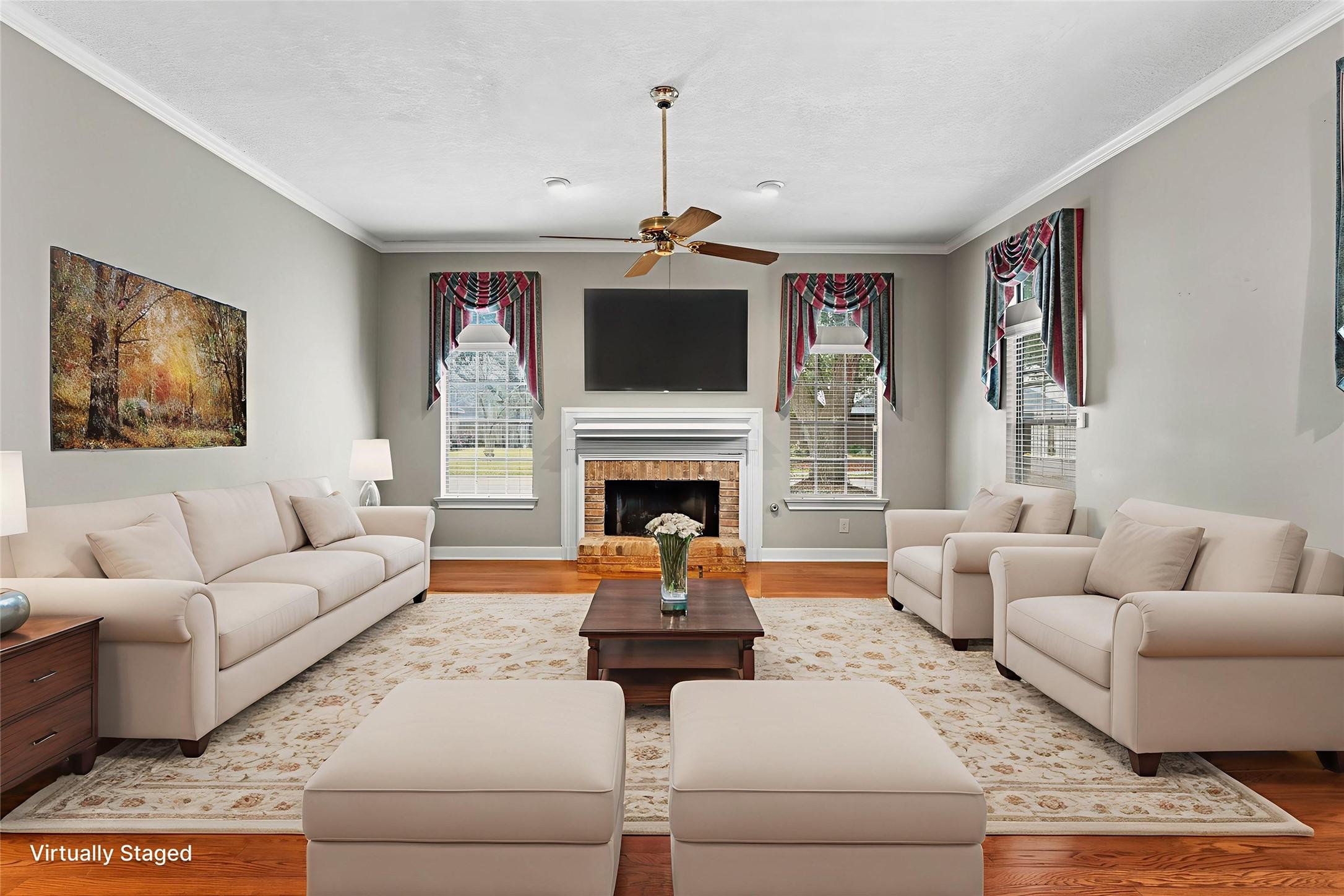 Image 4: Virtually staged to highlight its inviting scale,