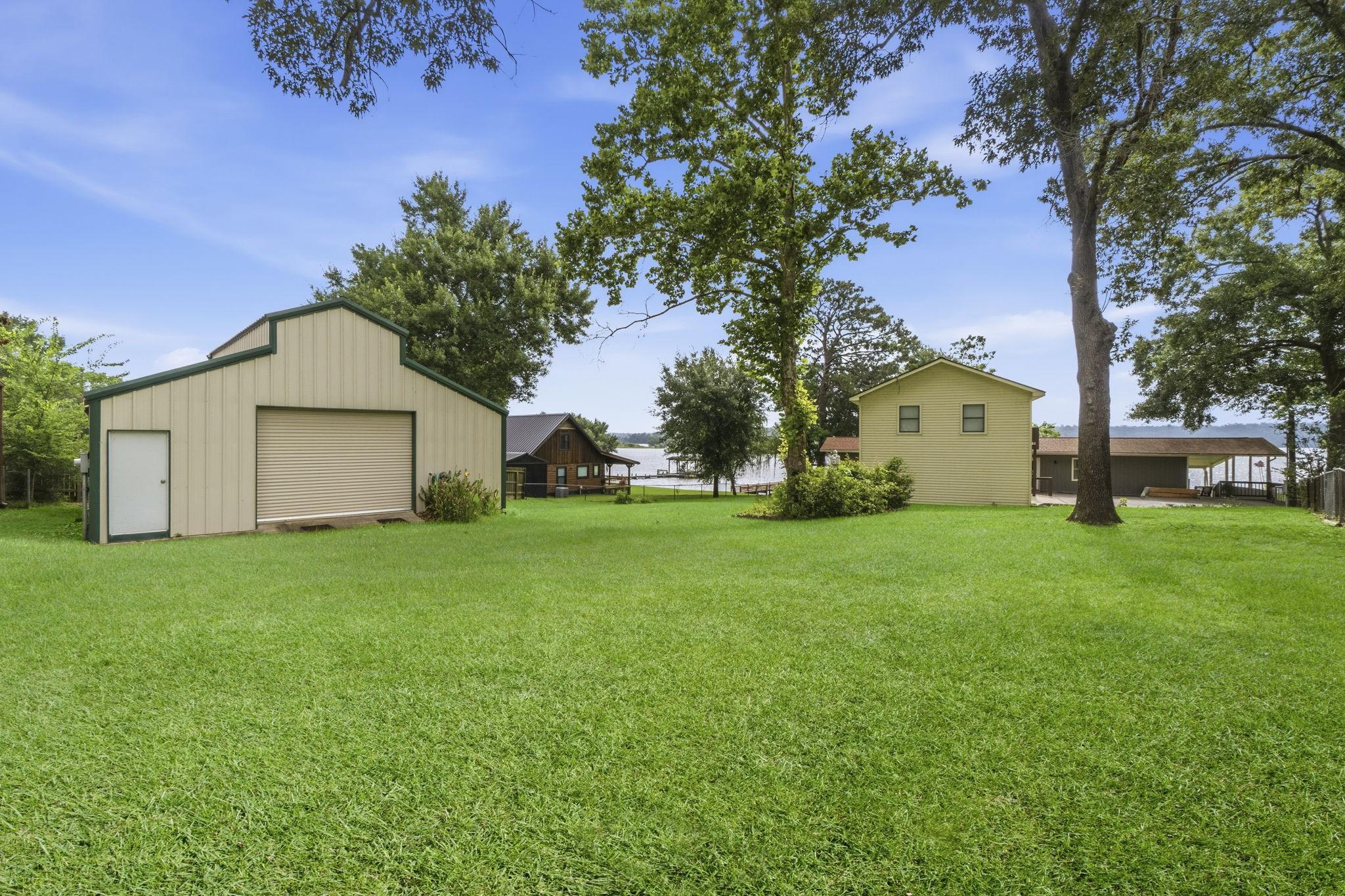 Image 2: View of incredible yard and home