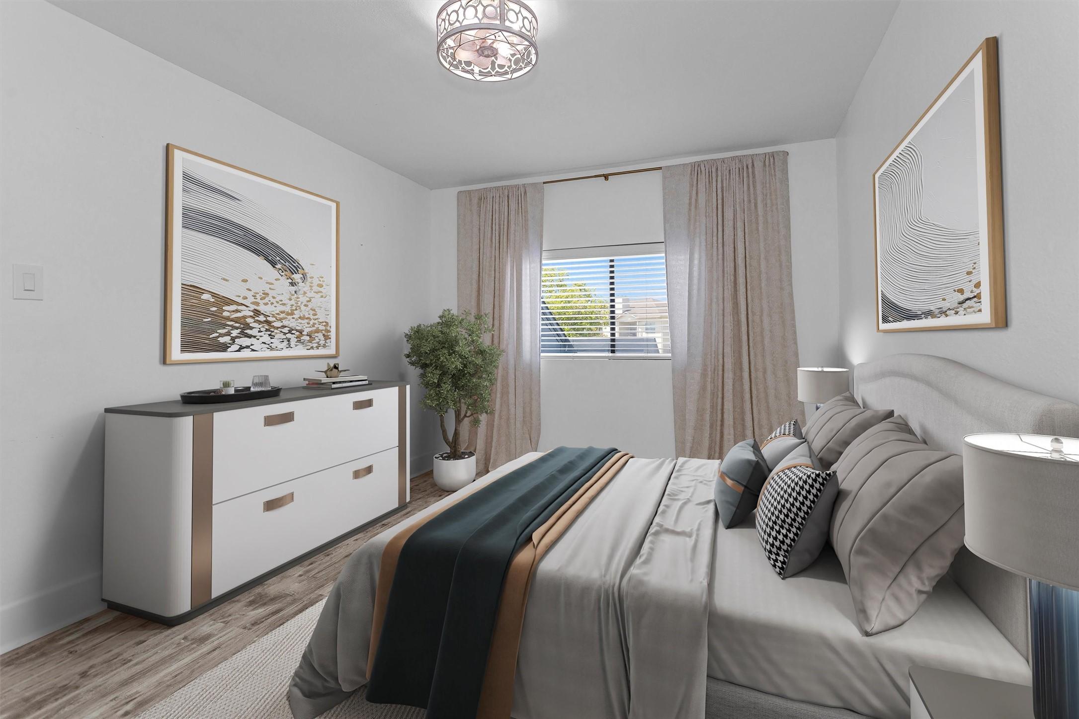 Image 4: The primary bedroom is large enough for a king-siz
