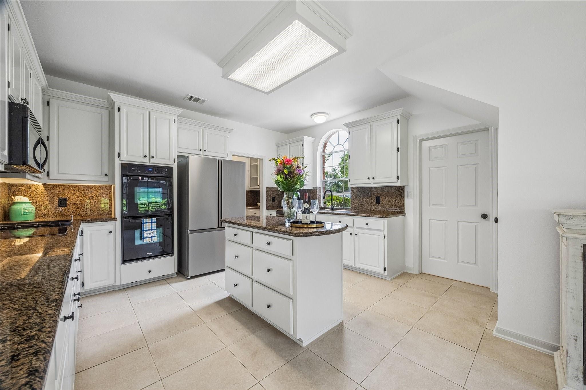 Image 3: Spacious Kitchen featuring granite counters, an is