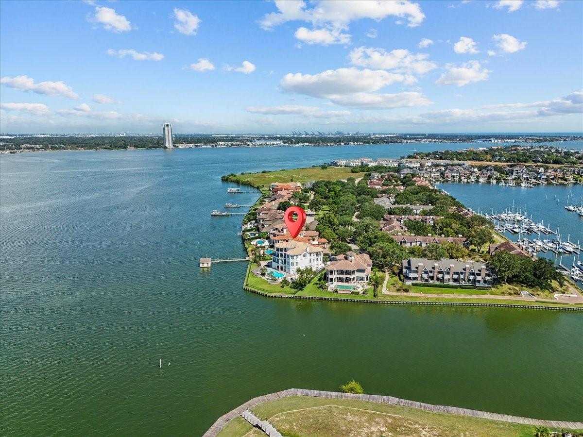 Image 2: Stunning waterfront view of the serene cove, perfe