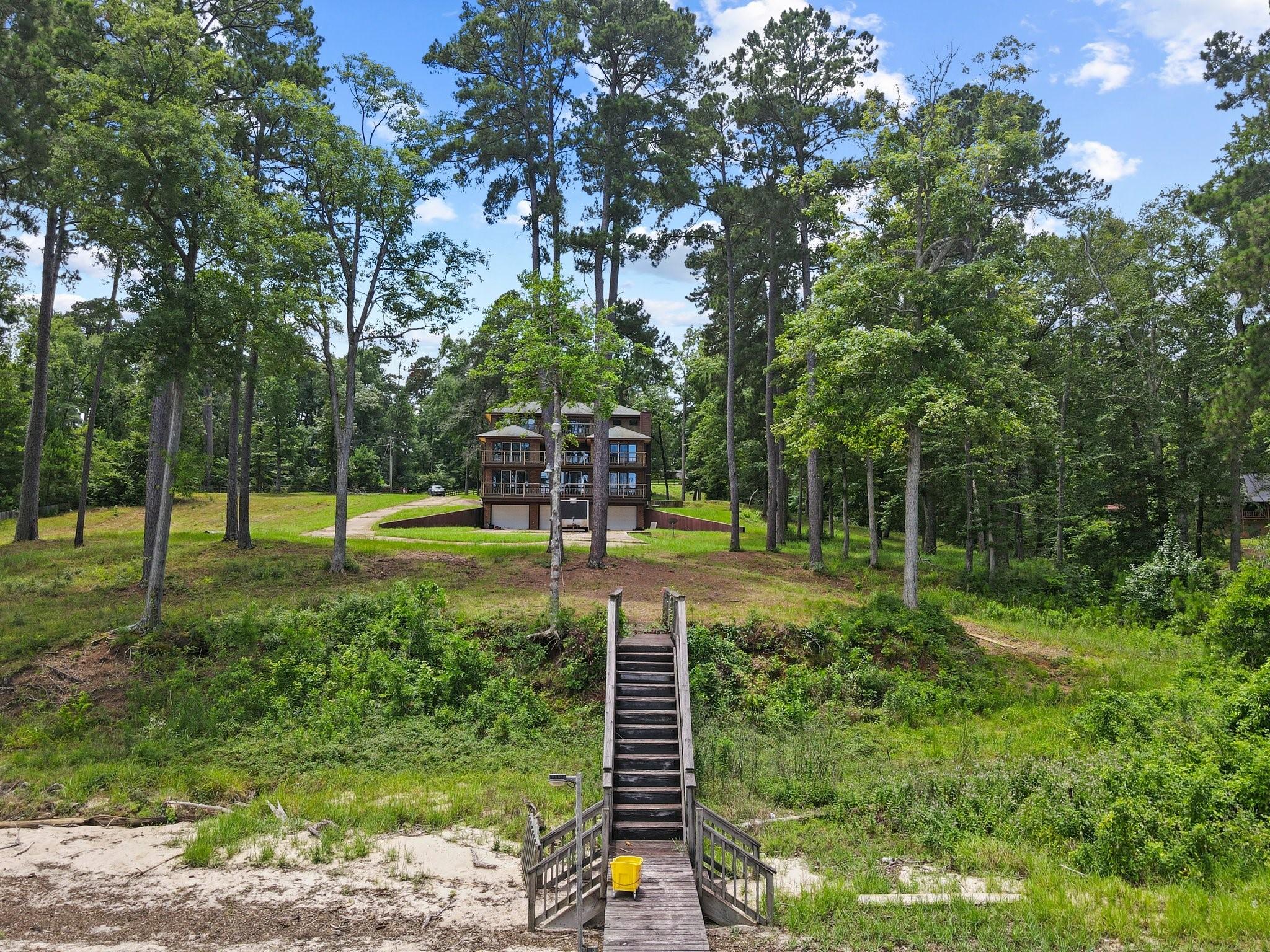 Image 3: View of the home from the boat dock