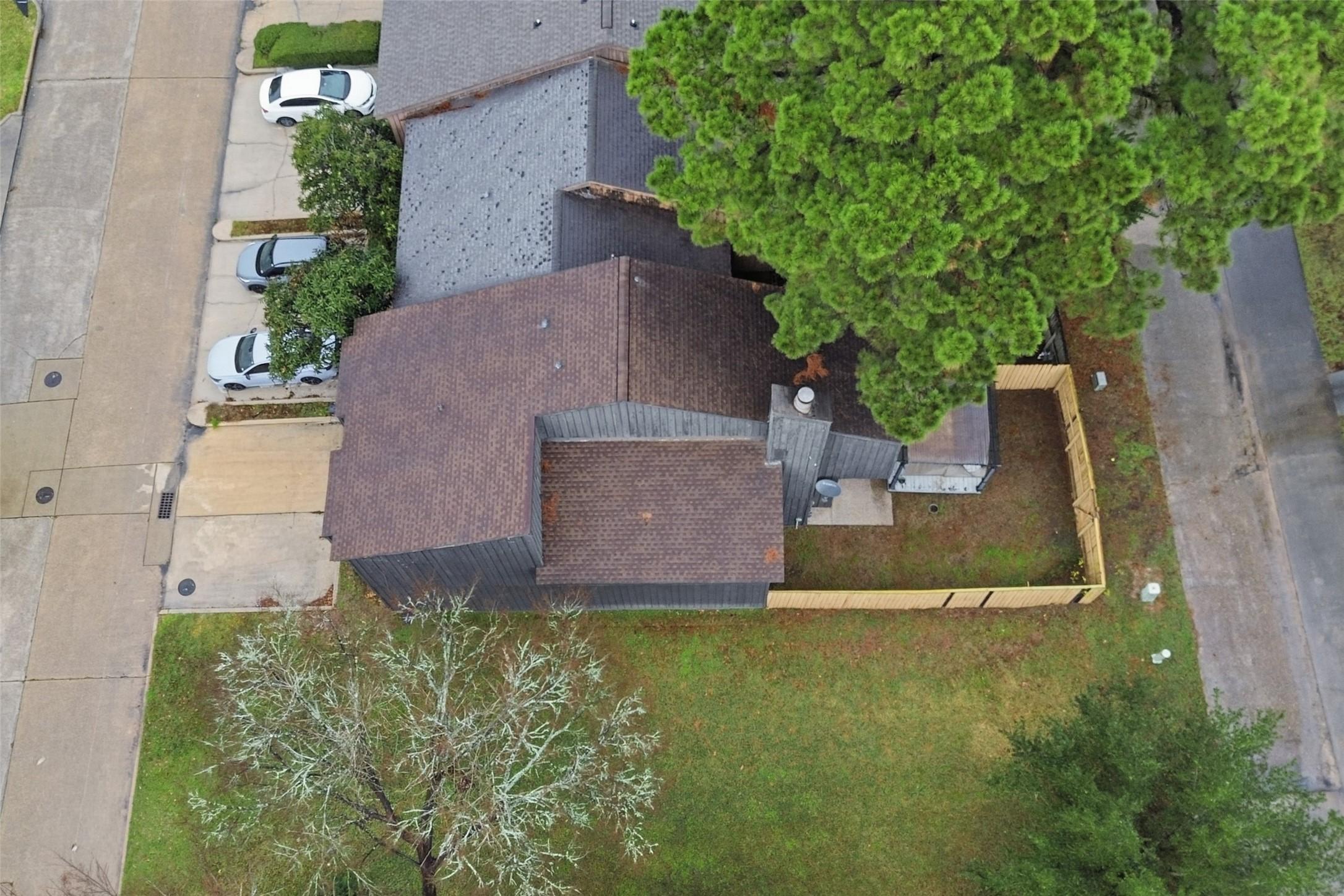 Image 3: Side aerial view of townhome. 3226 Poe is on the r