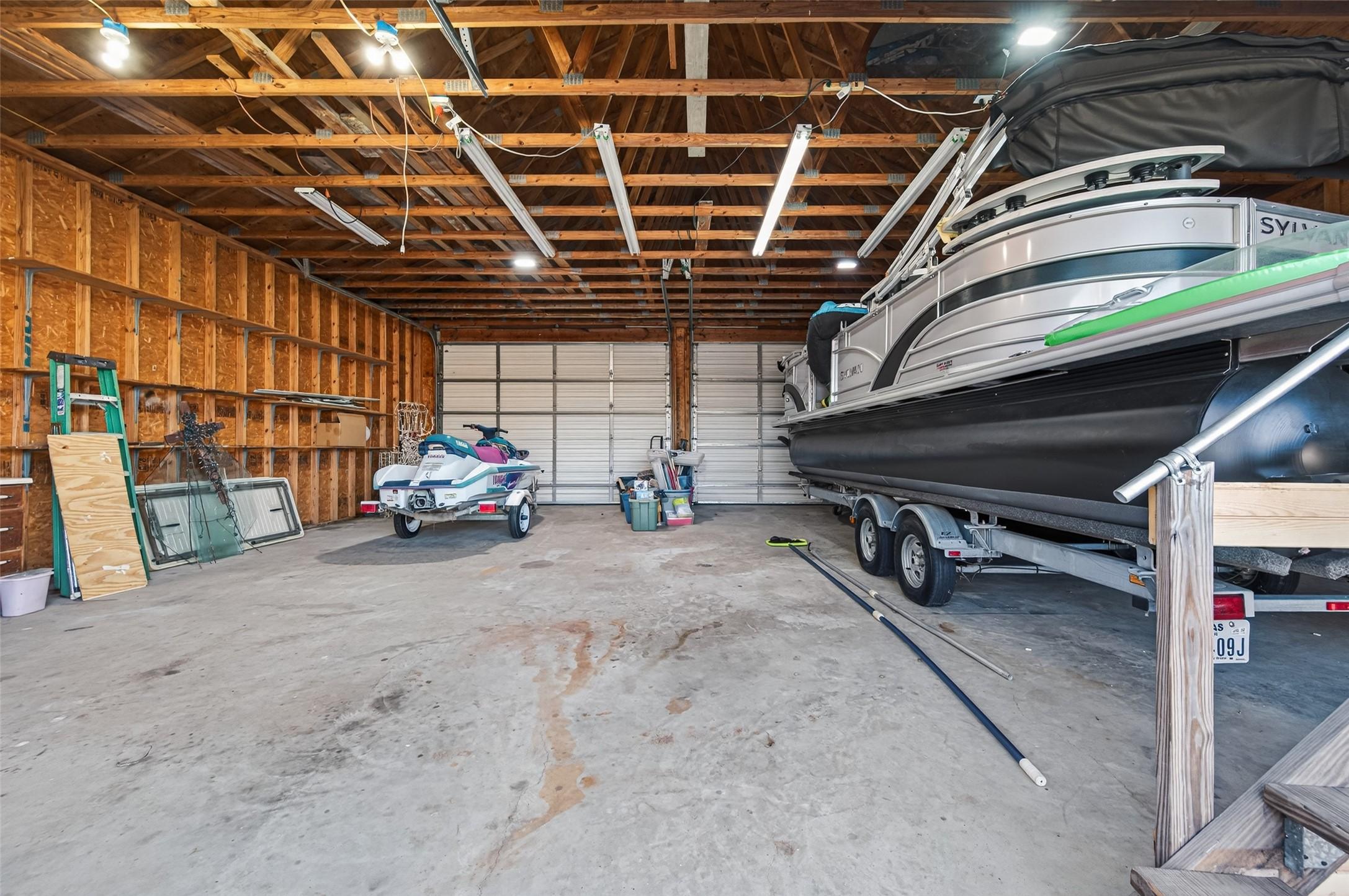 Image 4: Detached garage/shop is 35 x 35, with 2 front door