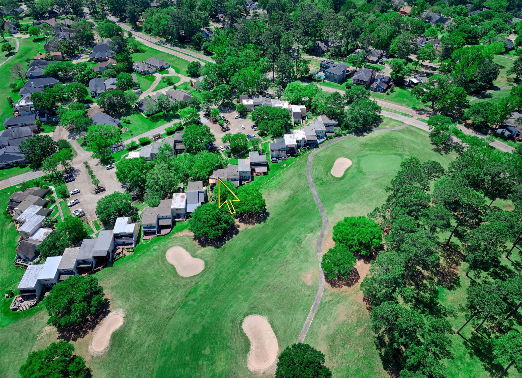 Image 4: Aerial shot showing the home located on the first