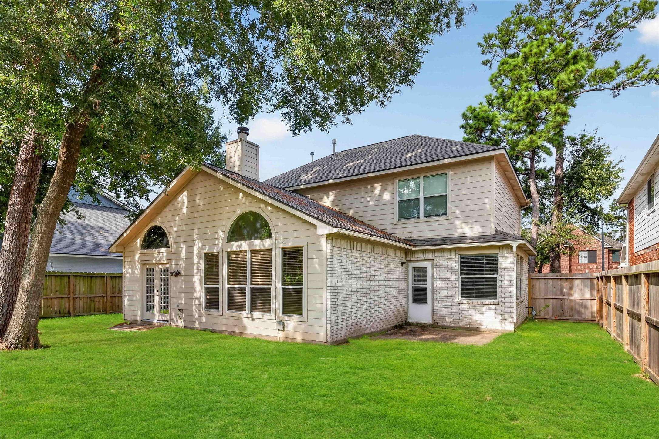 Image 2: Experience serene outdoor living in this charming