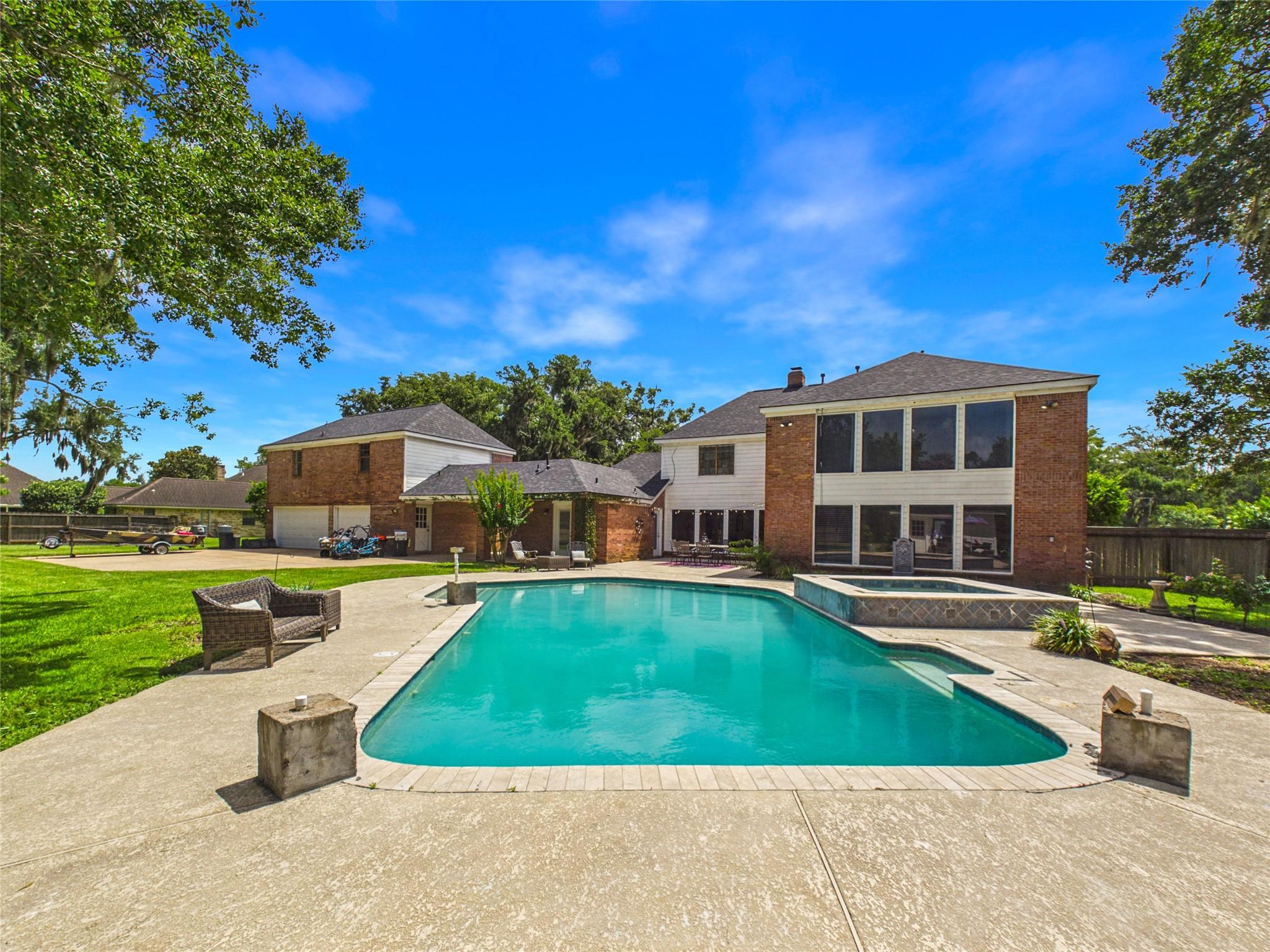 Image 3: pool and house view