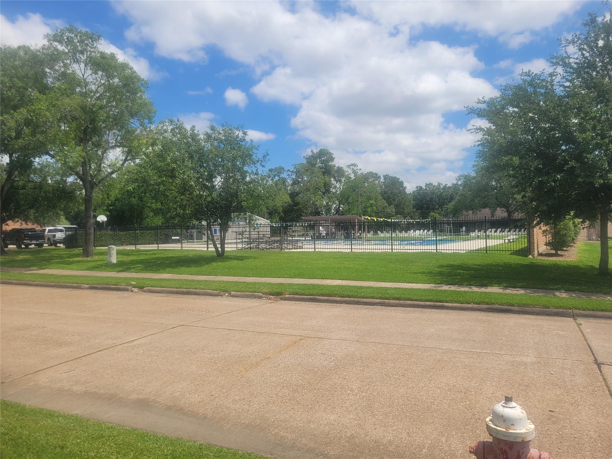 Image 4: Right across the street from community pool!