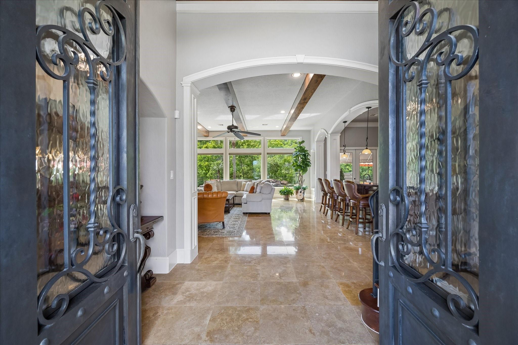 Image 4: Double iron doors open to stunning views