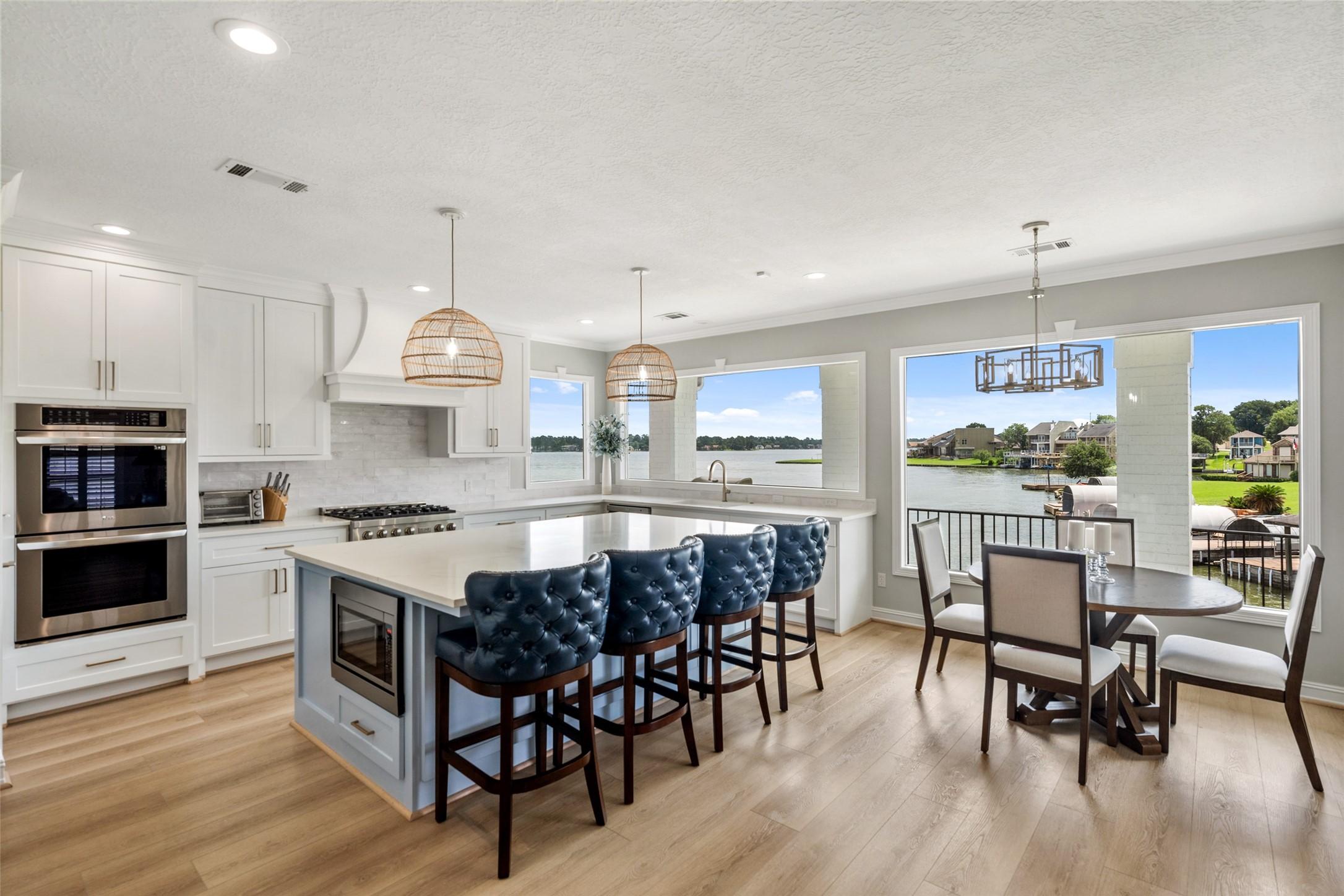 Image 4: Kitchen bathes in natural light with East facing w