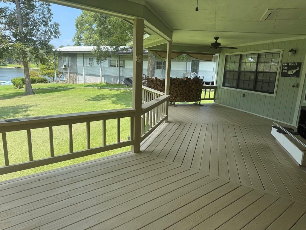Image 4: The large, covered porch is perfect for relaxing a