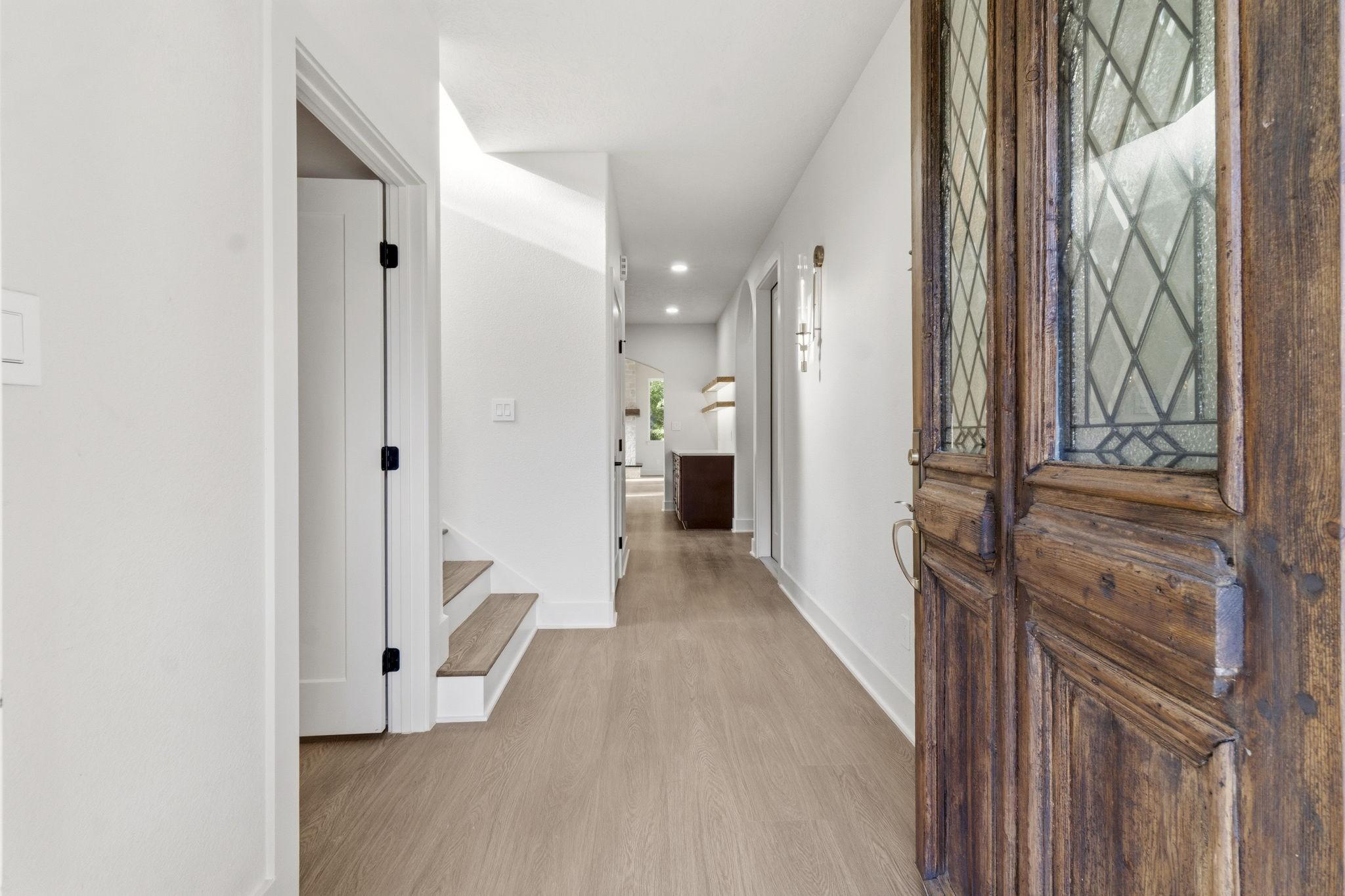 Image 4: Walk through the front door and tour this stunning
