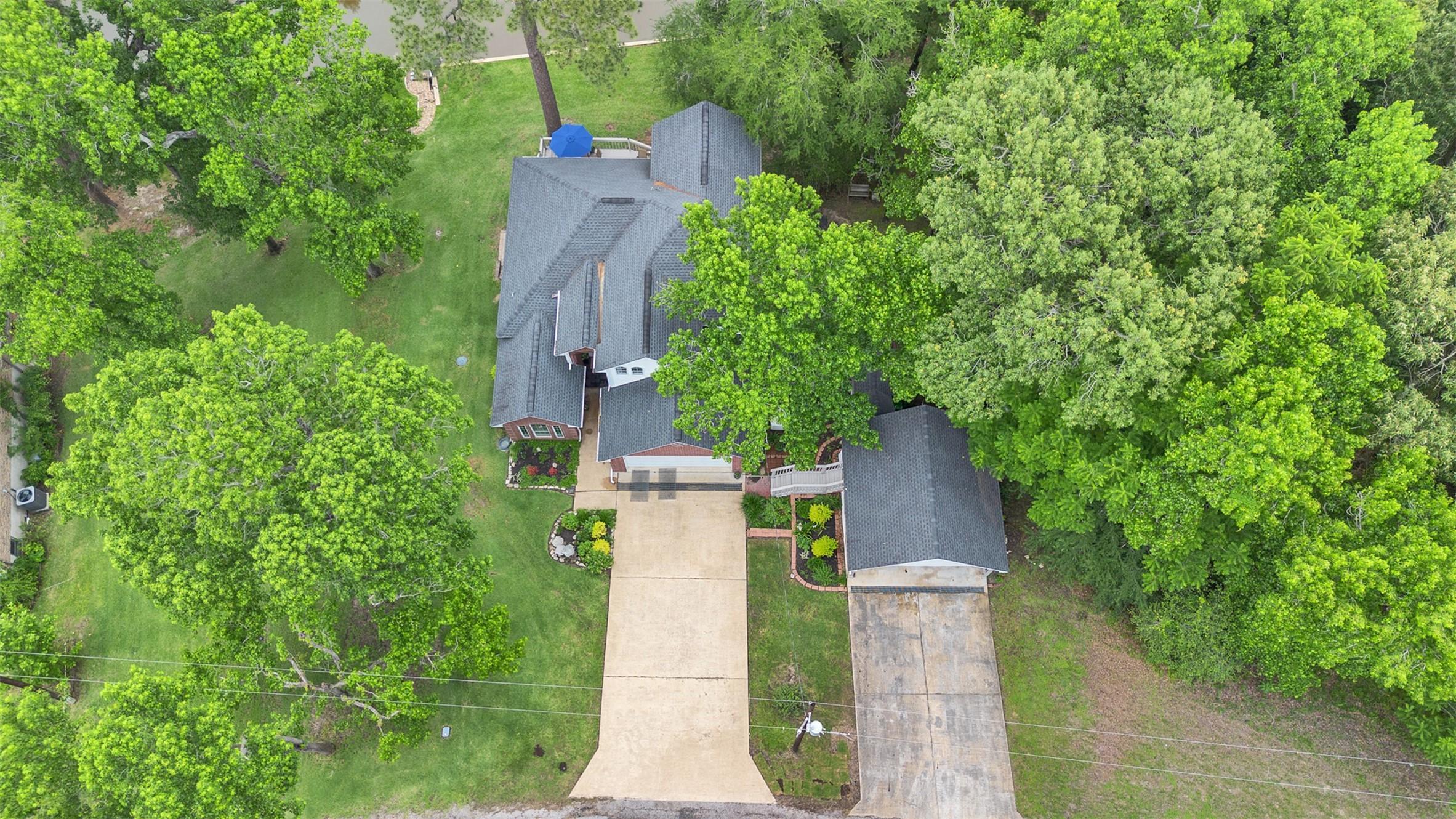 Image 4: The carport is on 1 lot, the house is on the 2nd l