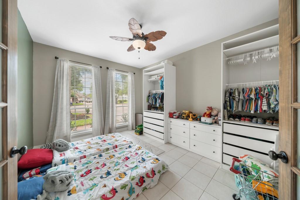Image 4: Flexible front room is currently used as a child's