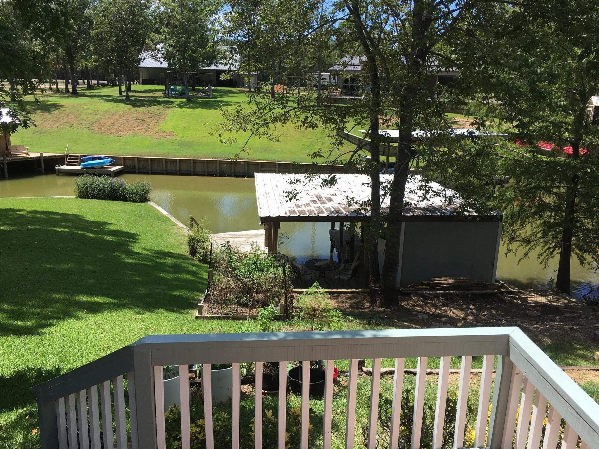 Image 4: Open deck and Covered Porch overlook the Double bo