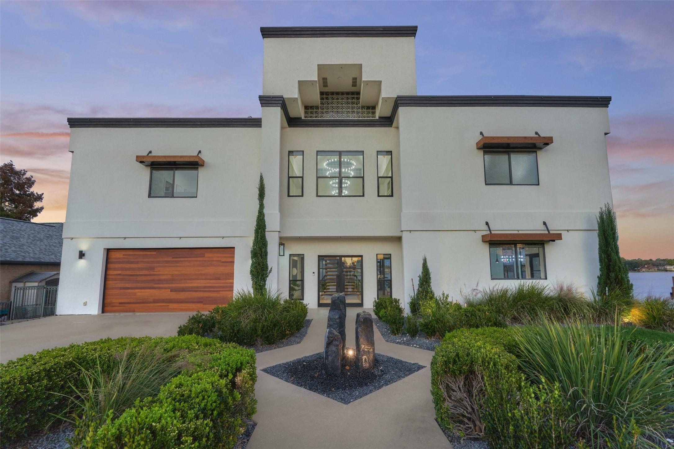 Image 4: This stunning elevation is complimented by a new r