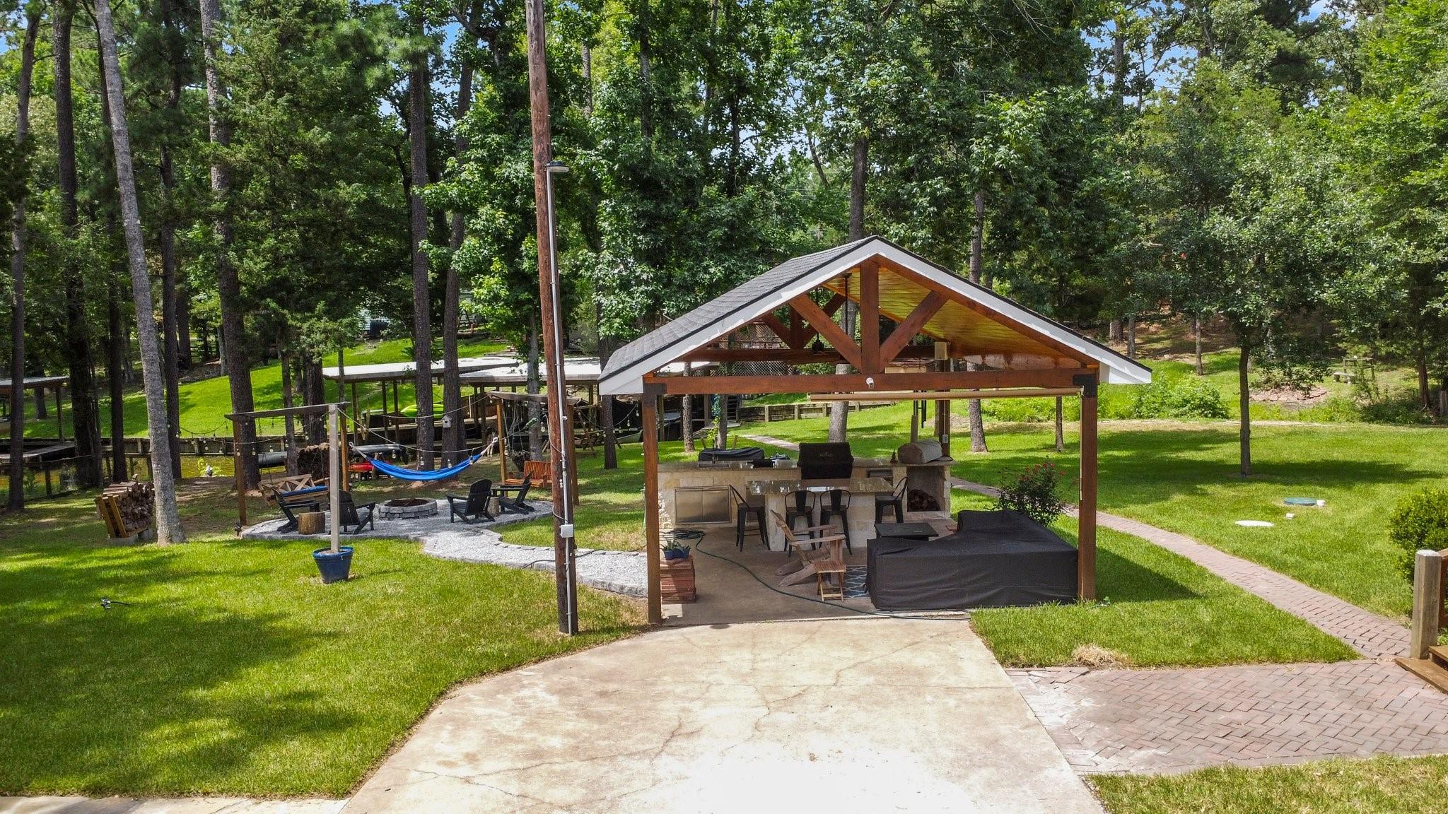Image 3: Showcases a serene, wooded area with scattered hom