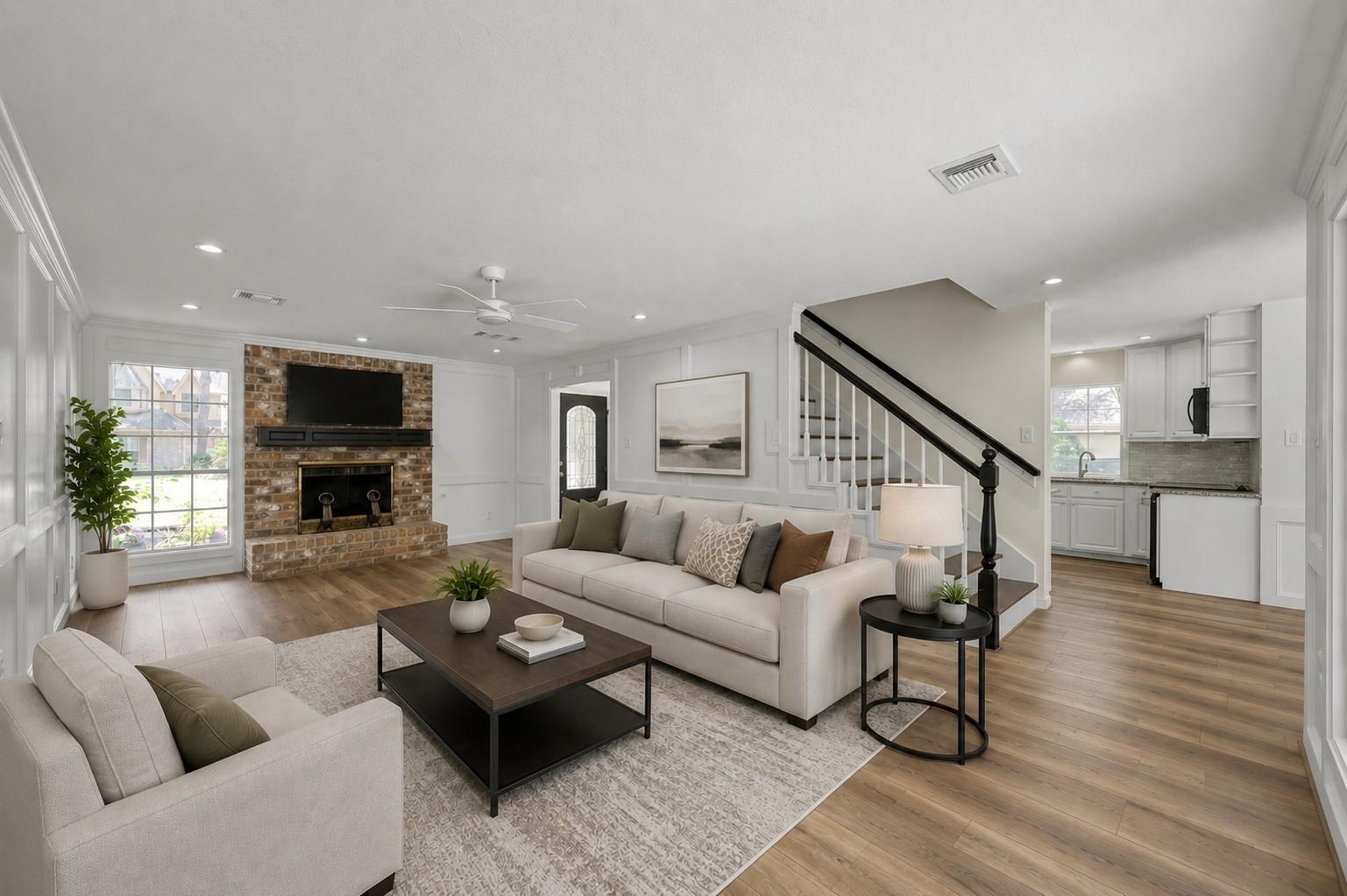 Image 4: VIRTUAL STAGING.  Bright, open-plan living area wi