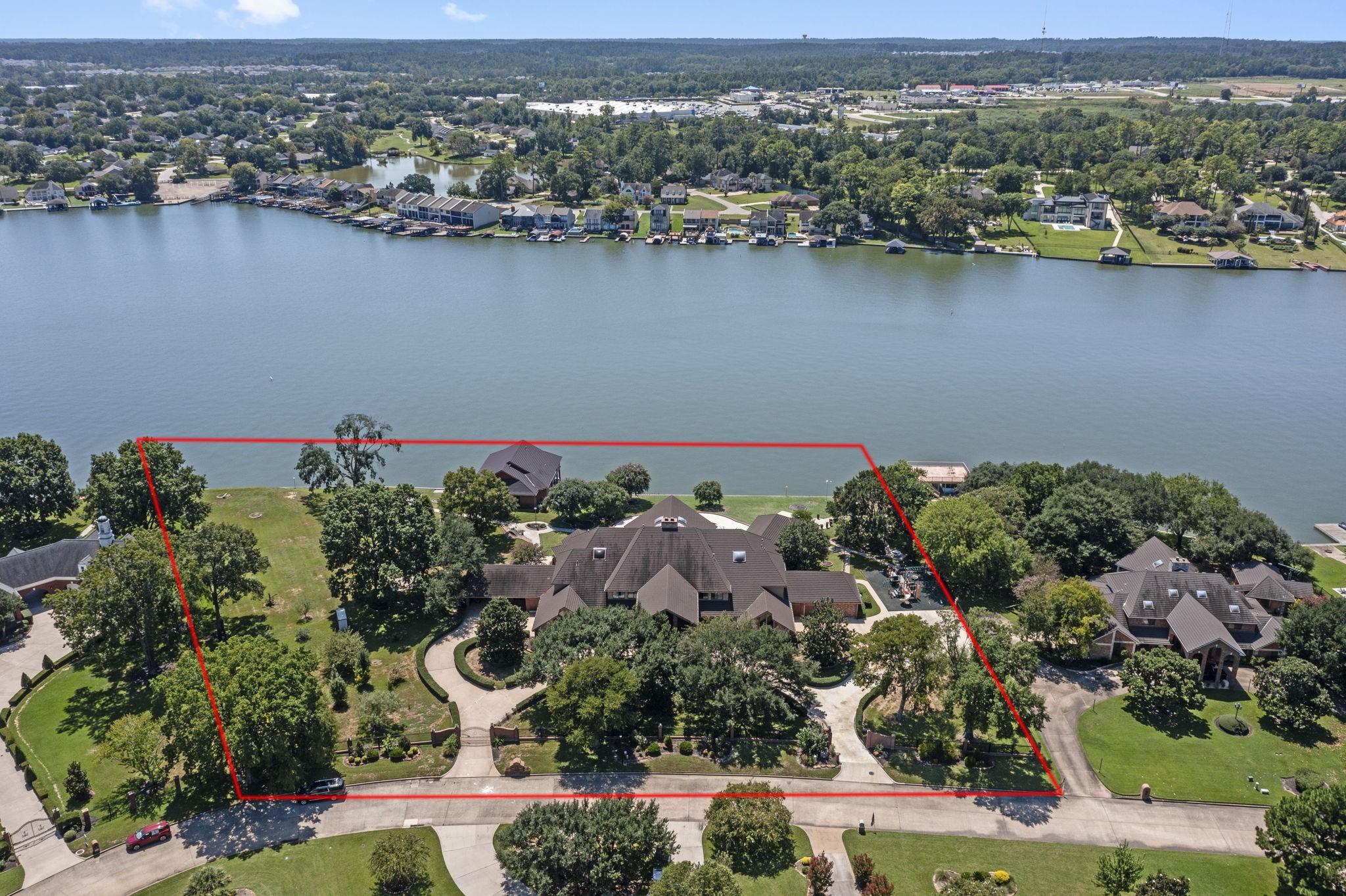 Image 3: This sprawling masterpiece is situated on 2.4 Lake