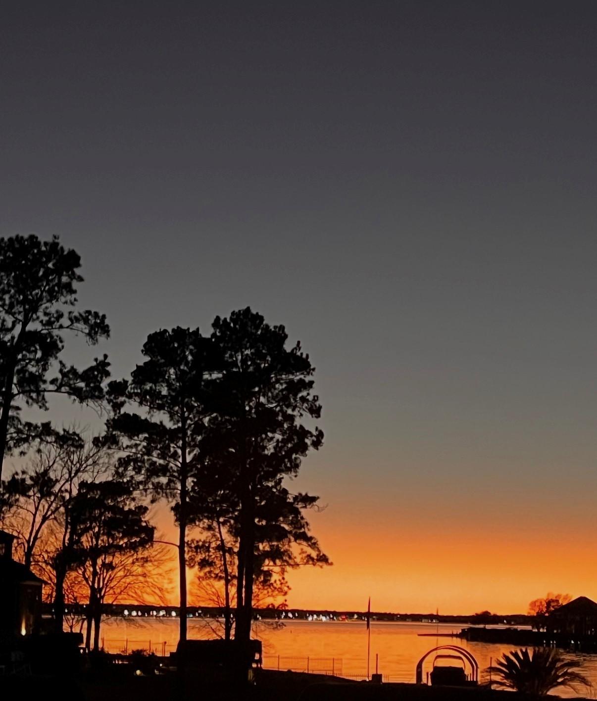Image 3: Here is your nighttime view of the lake. Nestled i