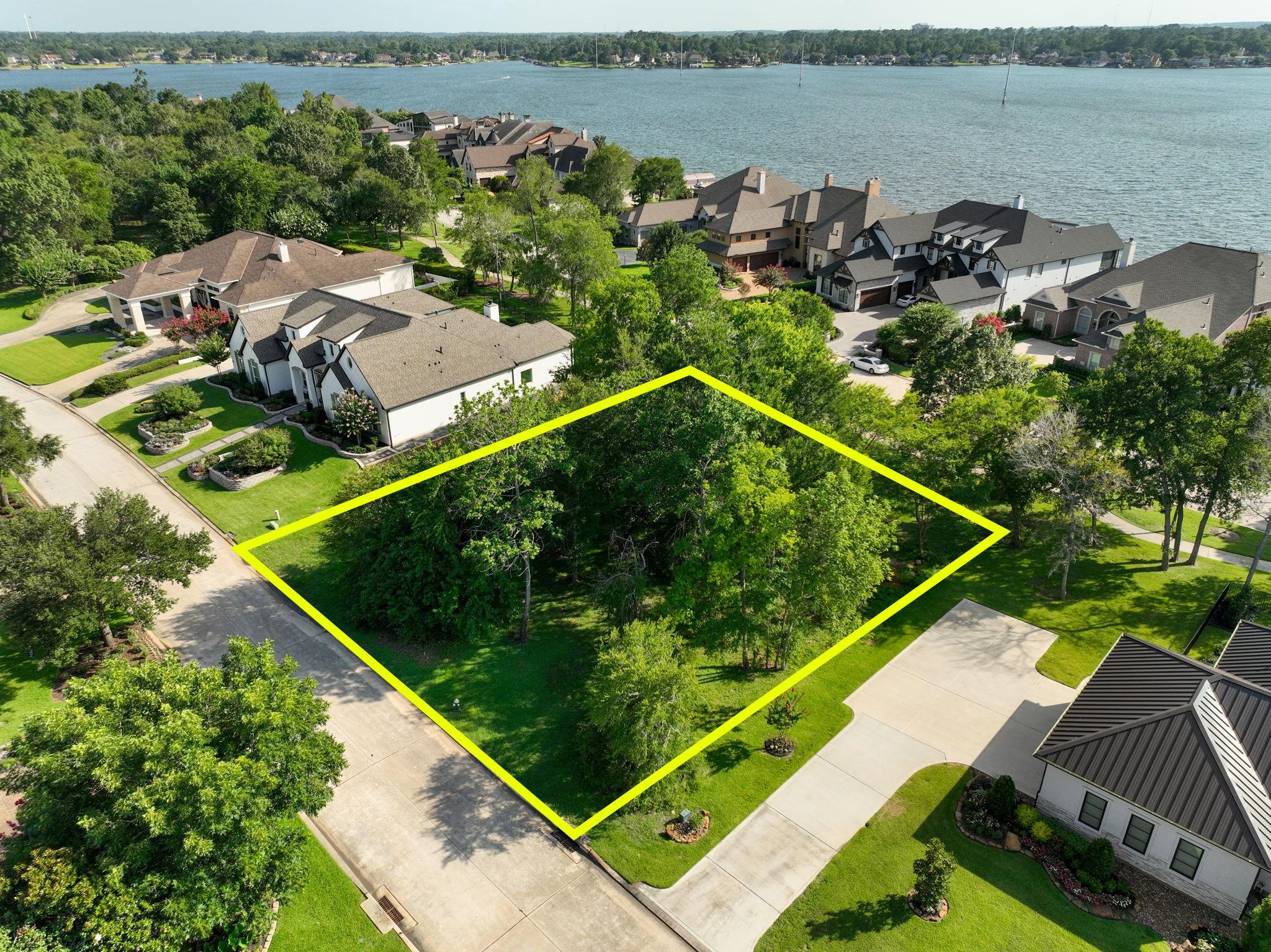 Image 2: This lovely wooded lot is almost 1/2 acre and read